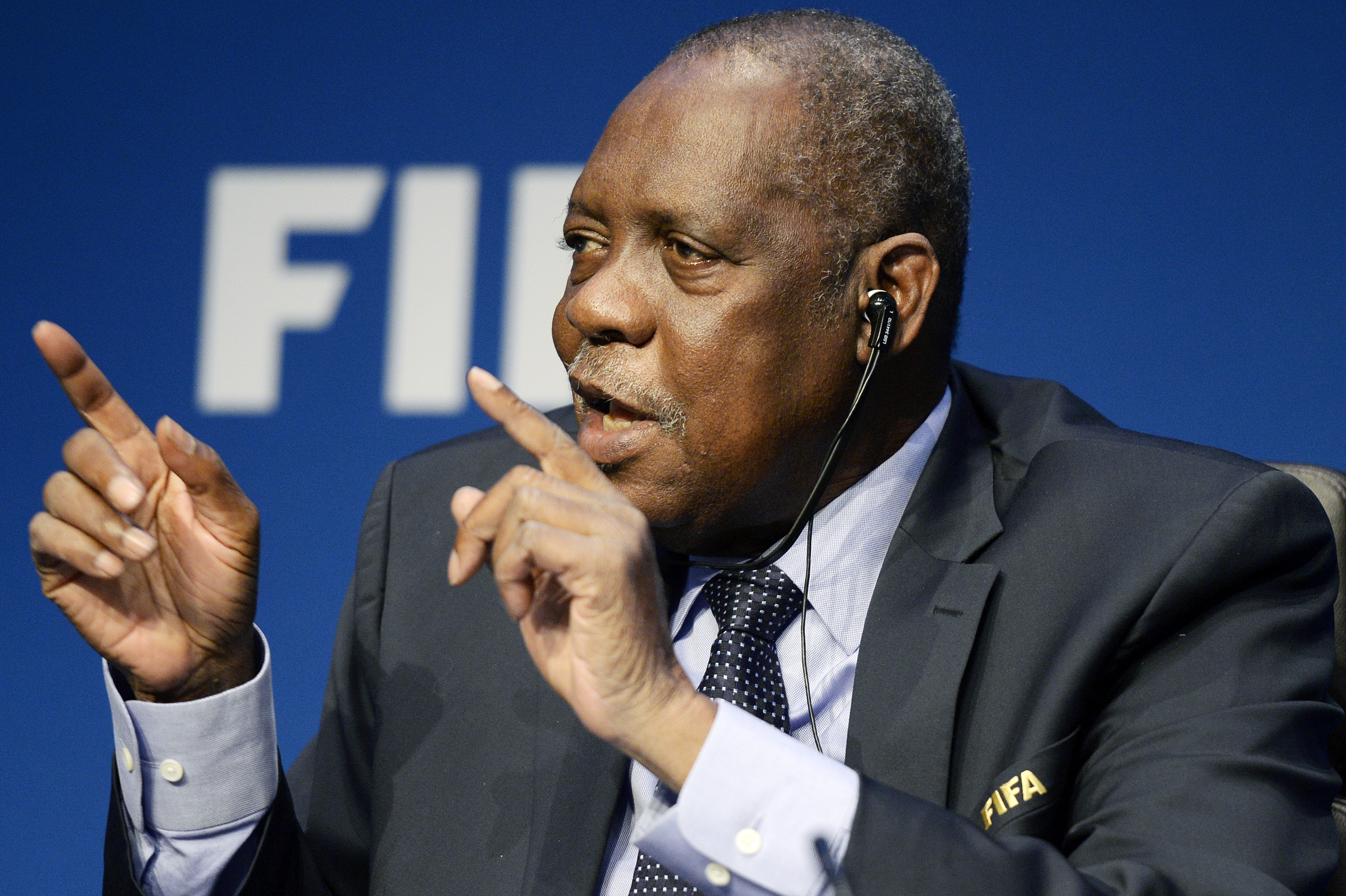 FILE - Issa Hayatou, acting FIFA President, speaks during a news conference at FIFA Headquarters in Zurich, Switzerland, Dec. 3, 2015. 