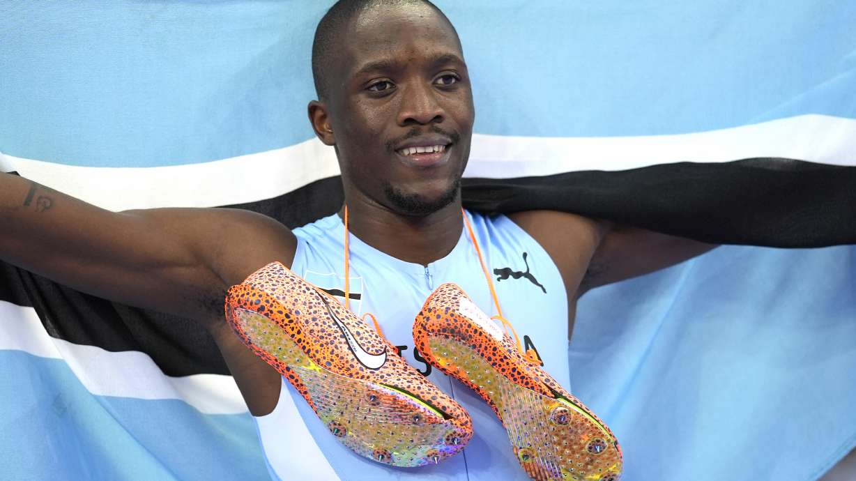 Letsile Tebogo, of Botswana, celebrates after winning the men's 200-meter final at the 2024 Summer Olympics, Thursday, Aug. 8, 2024, in Saint-Denis, France.