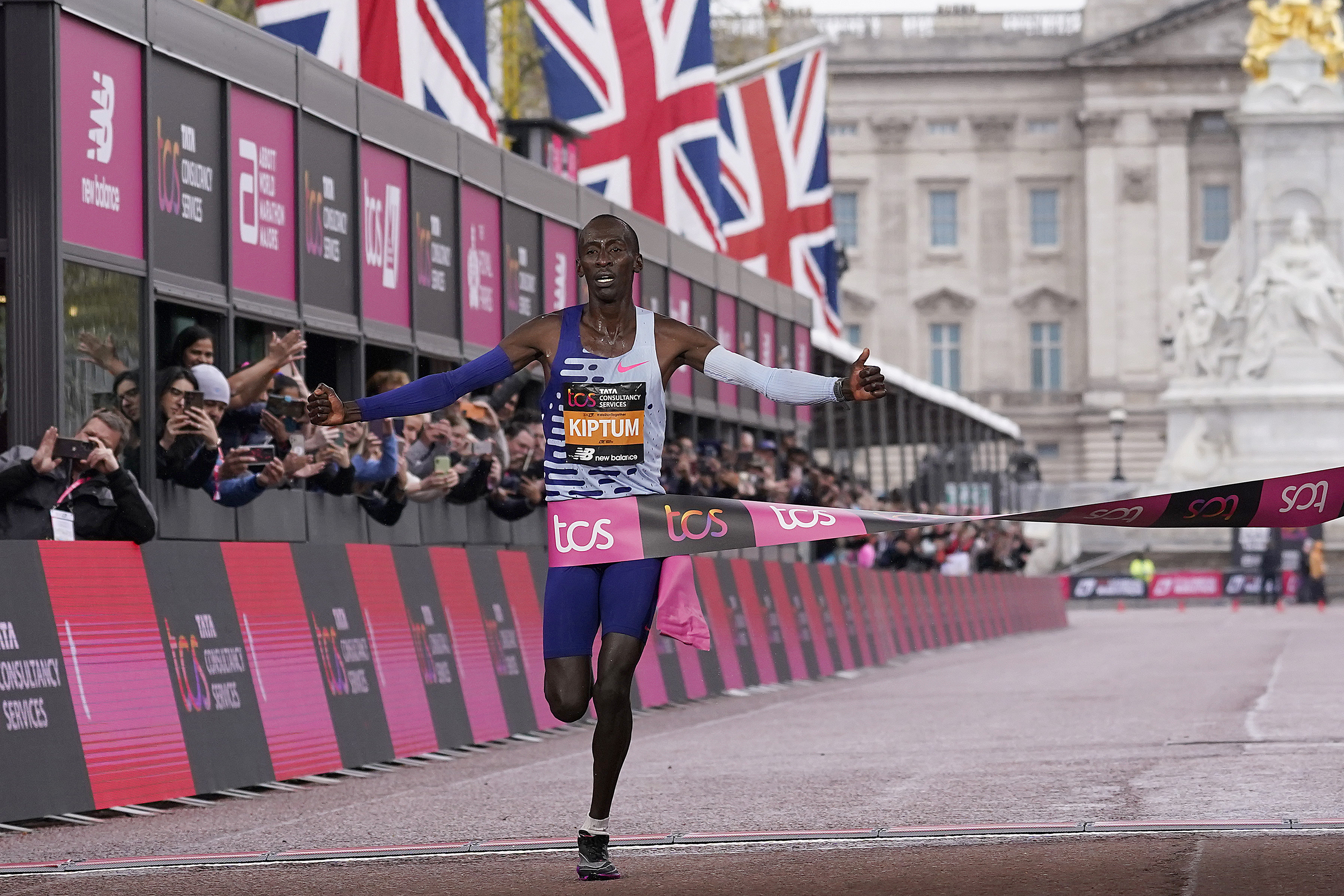 FILE - Kenya's Kelvin Kiptum crosses the finish line to win the men's race at the London Marathon in London, Sunday, April 23, 2023.