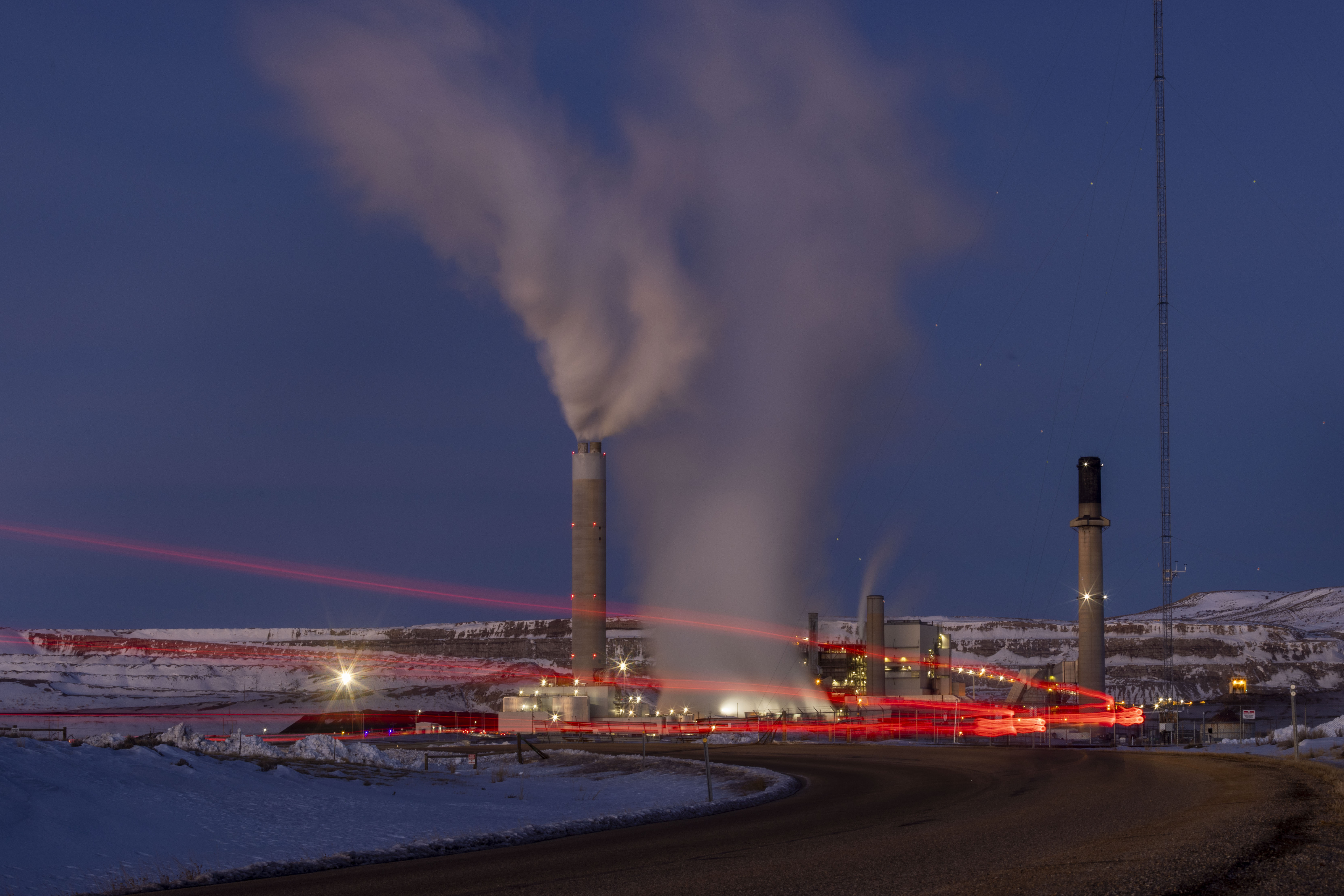 Taillights trace the path of a vehicle at the Naughton Power Plant, Jan. 13, 2022, in Kemmerer, Wyo. The United States is speeding up efforts to license and build a new generation of nuclear reactors to supply carbon-free electricity.