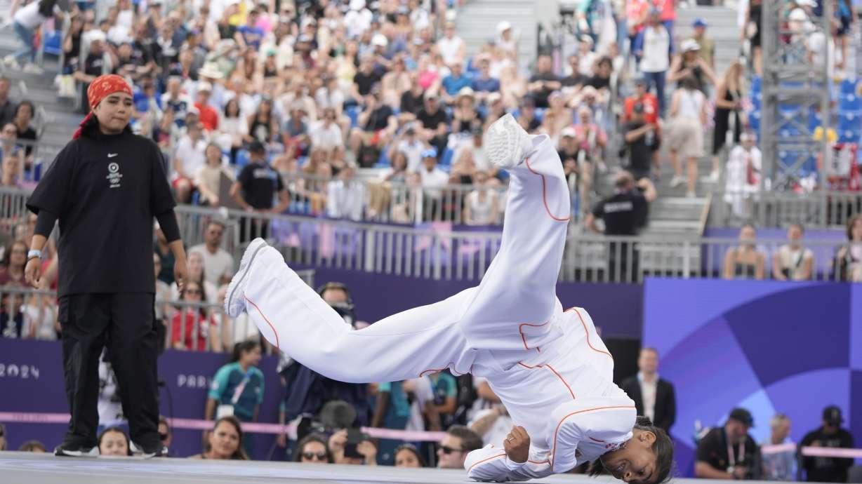 Netherland's India Sardjoe, known as B-Girl India, right, competes during the B-Girls Pre-Qualifier Battle of the breaking competition at La Concorde Urban Park at the 2024 Summer Olympics, Friday, Aug. 9, 2024, in Paris, France.
