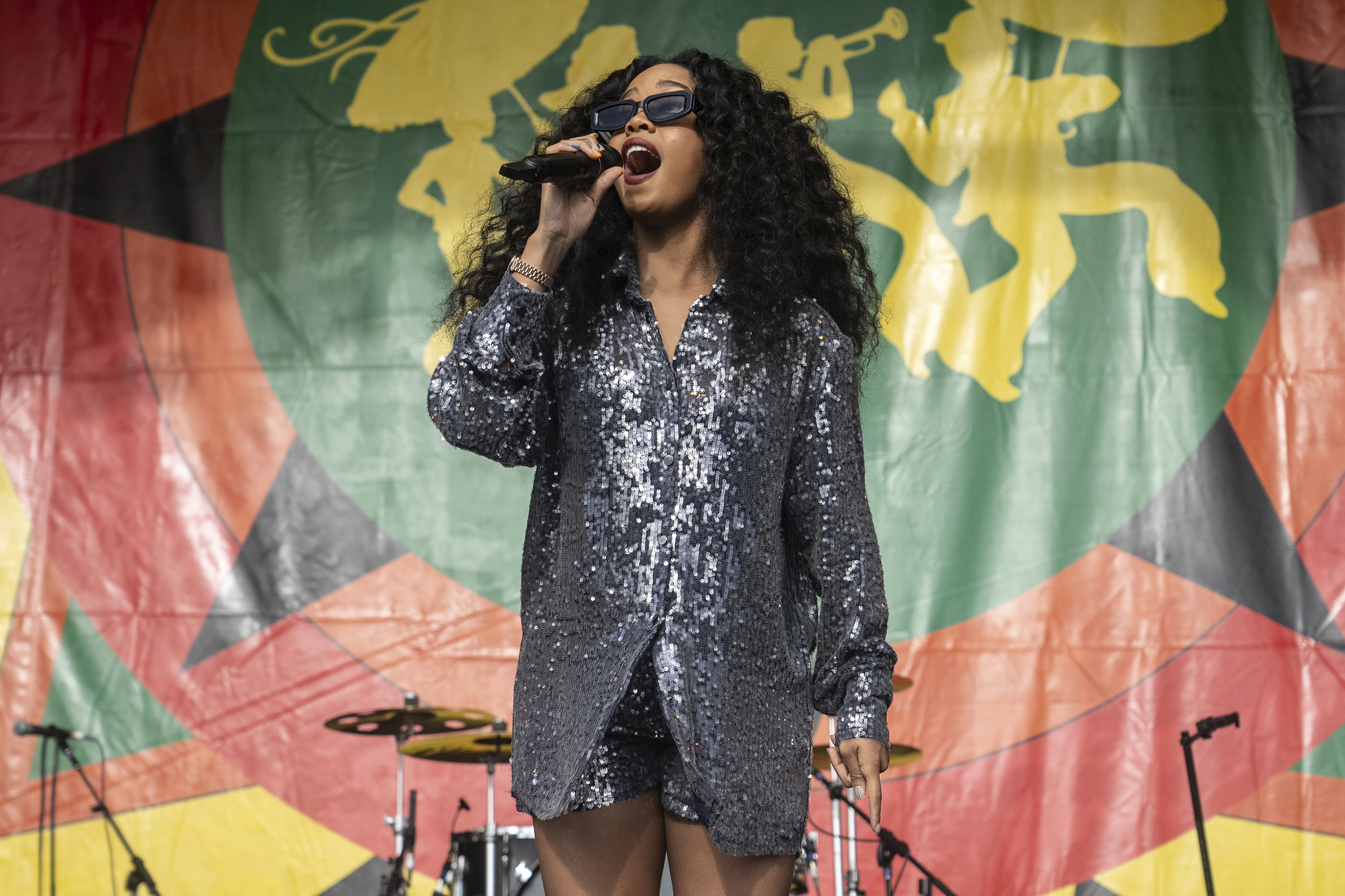 FILE - H.E.R. performs at the 2023 New Orleans Jazz & Heritage Festival on May 6, 2023.