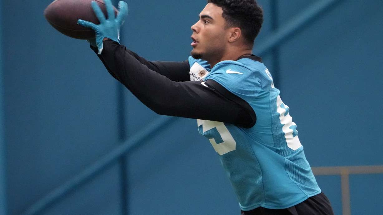 FILE - Jacksonville Jaguars tight end Brenton Strange (85) makes a reception during the team's NFL football practice, Tuesday, June 11, 2024, in Jacksonville, Fla.