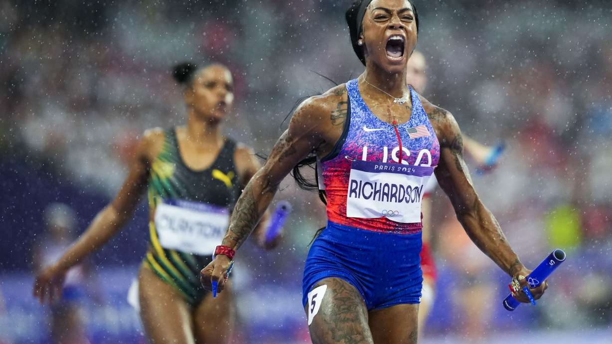 Sha'carri Richardson 0f the United States, celebrates after winning the women's 4 x 400-meter relay final at the 2024 Summer Olympics, Friday, Aug. 9, 2024, in Saint-Denis, France.