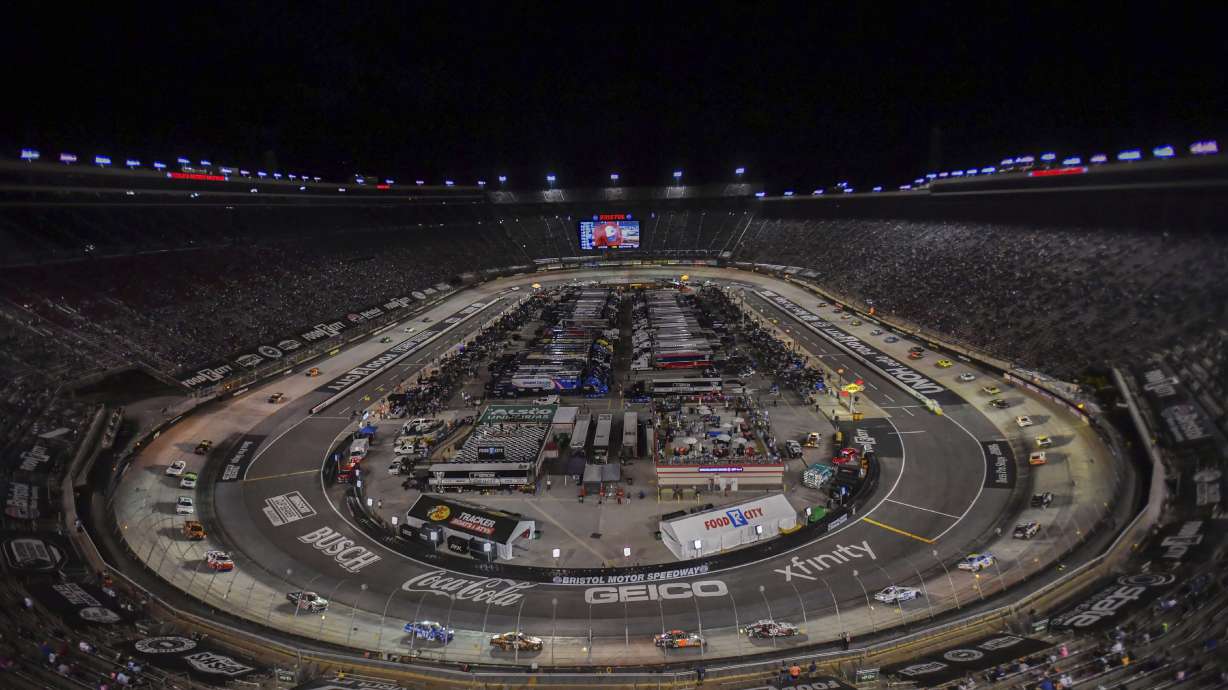 FILE - Drivers make their way around Bristol Motor Speedway during a caution period in the NASCAR Xfinity Series auto race, Sept. 15, 2023, in Bristol, Tenn.