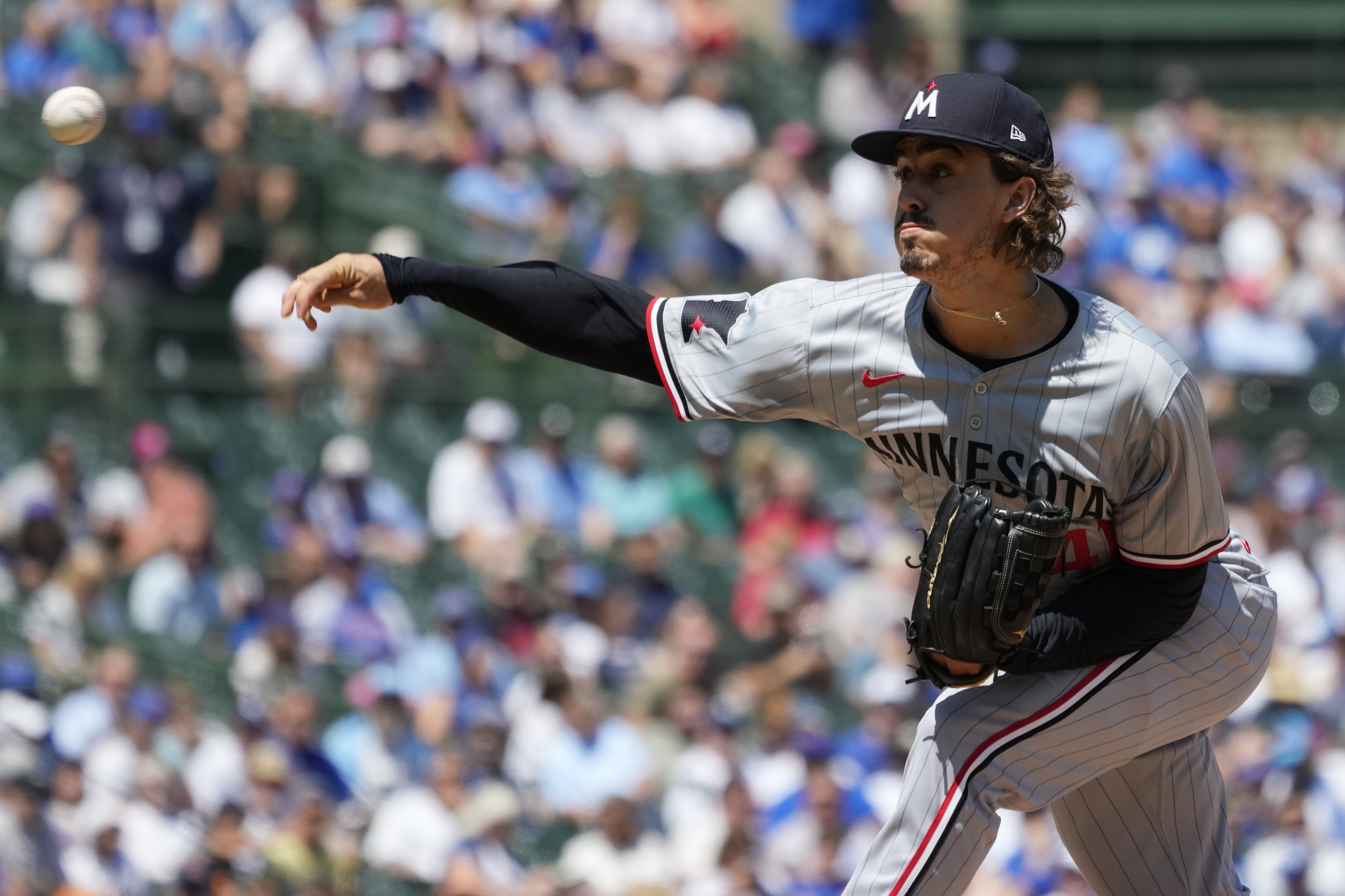 Minnesota Twins starting pitcher Joe Ryan throws against the Chicago Cubs during the first inning of a baseball game in Chicago, Wednesday, Aug. 7, 2024. 