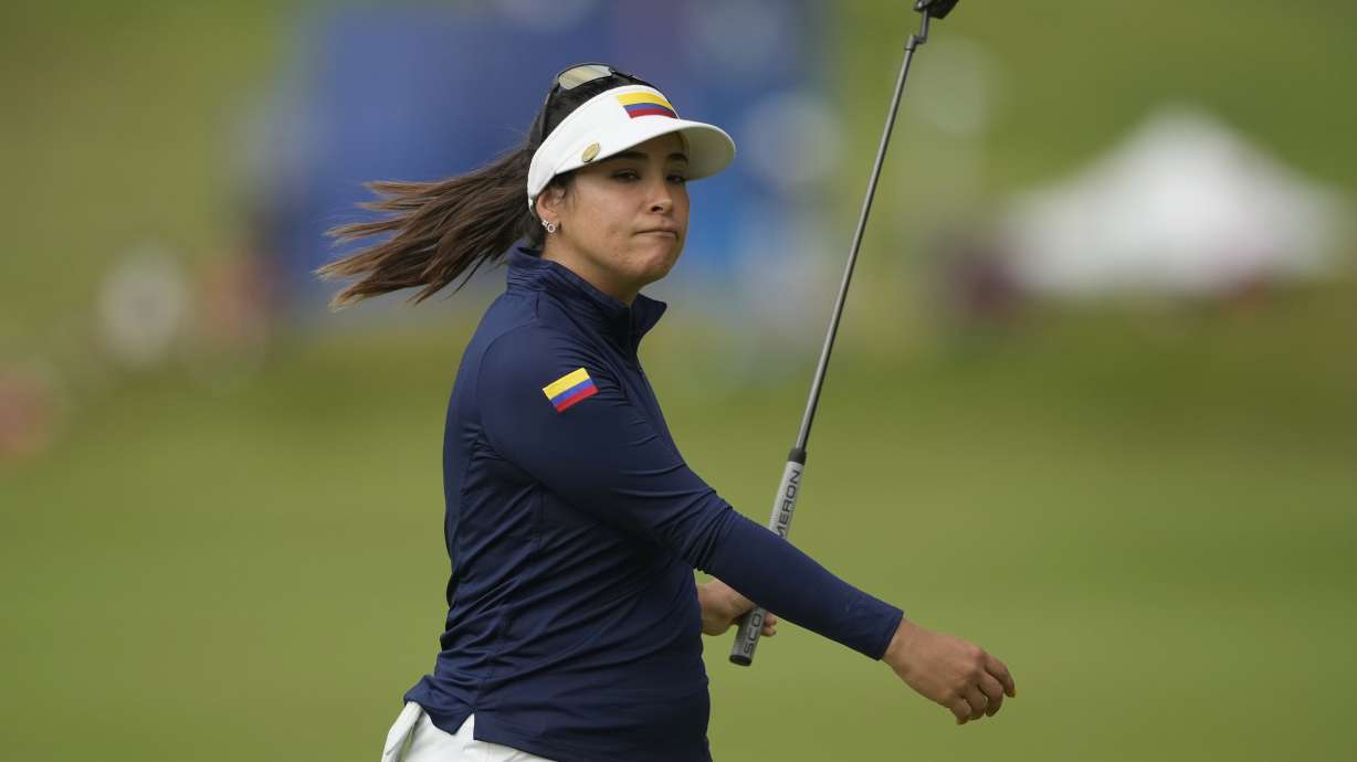 Maria Jose Uribe, of Colombia, reacts after missing a putt on the 13th green during the third round of the women's golf event at the 2024 Summer Olympics, Friday, Aug. 9, 2024, at Le Golf National, in Saint-Quentin-en-Yvelines, France.