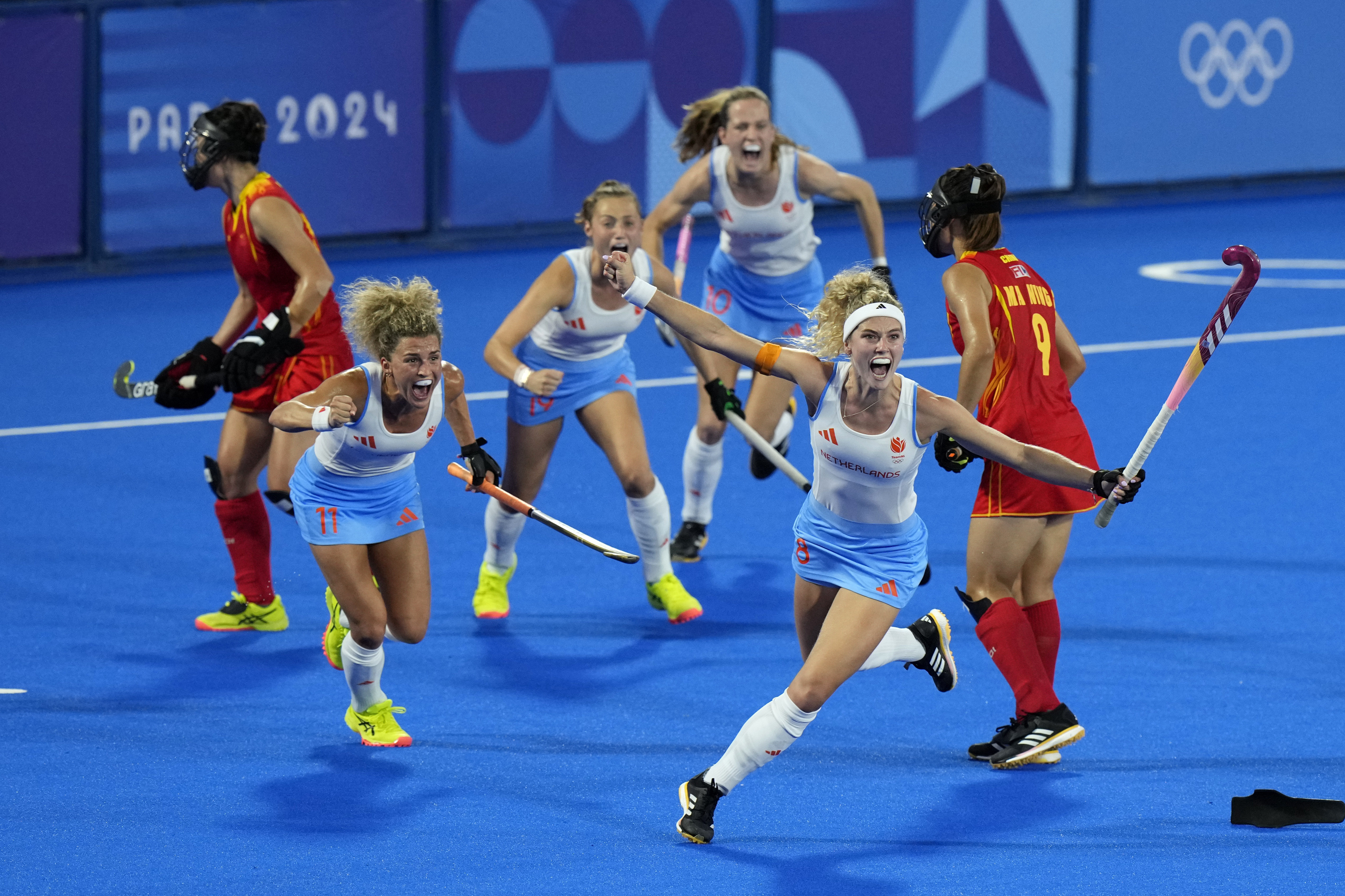 Netherlands' Yibbi Jansen, second right, celebrates after scoring her side's first goal during the women's gold medal field hockey match between China and Netherlands at the Yves-du-Manoir Stadium during the 2024 Summer Olympics, Friday, Aug. 9, 2024, in Colombes, France. 