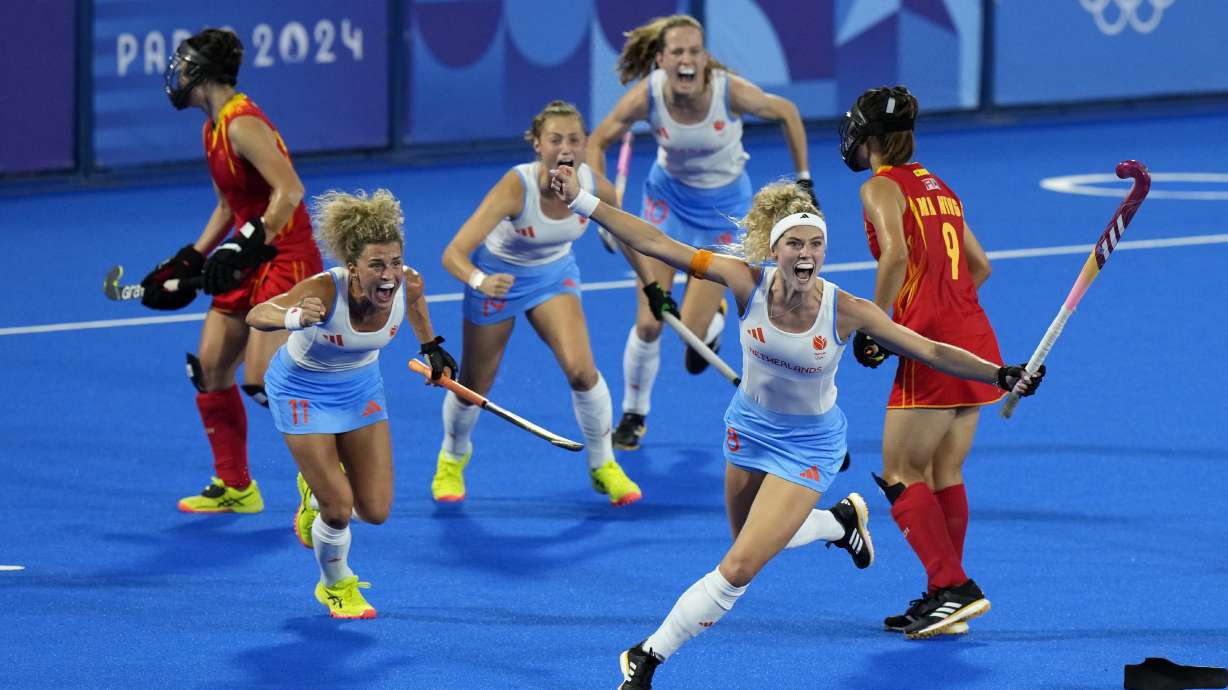 Netherlands' Yibbi Jansen, second right, celebrates after scoring her side's first goal during the women's gold medal field hockey match between China and Netherlands at the Yves-du-Manoir Stadium during the 2024 Summer Olympics, Friday, Aug. 9, 2024, in Colombes, France.