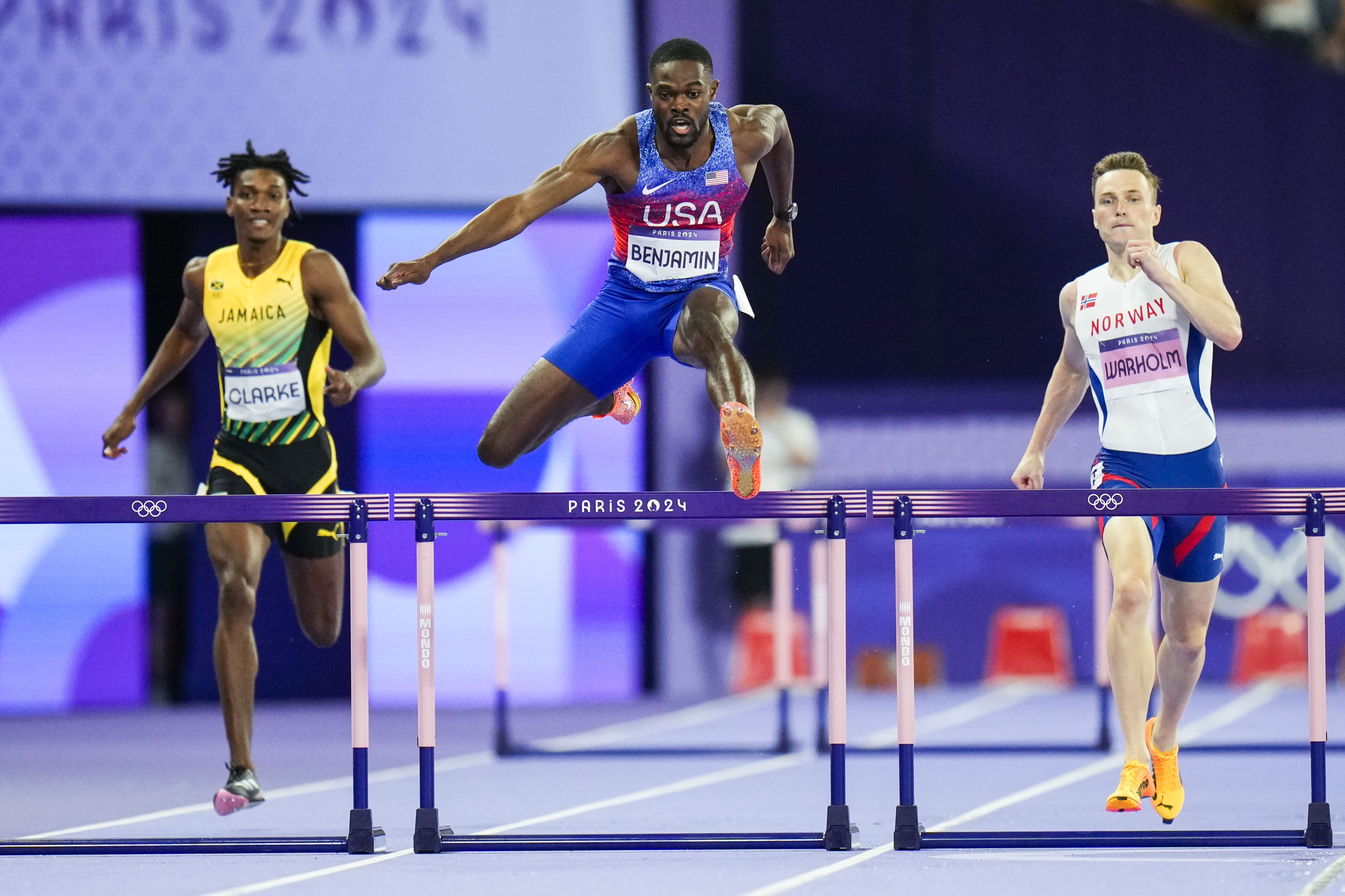 Rai Benjamin, of the United States, competes during the men's 400-meter hurdles final at the 2024 Summer Olympics, Friday, Aug. 9, 2024, in Saint-Denis, France. 