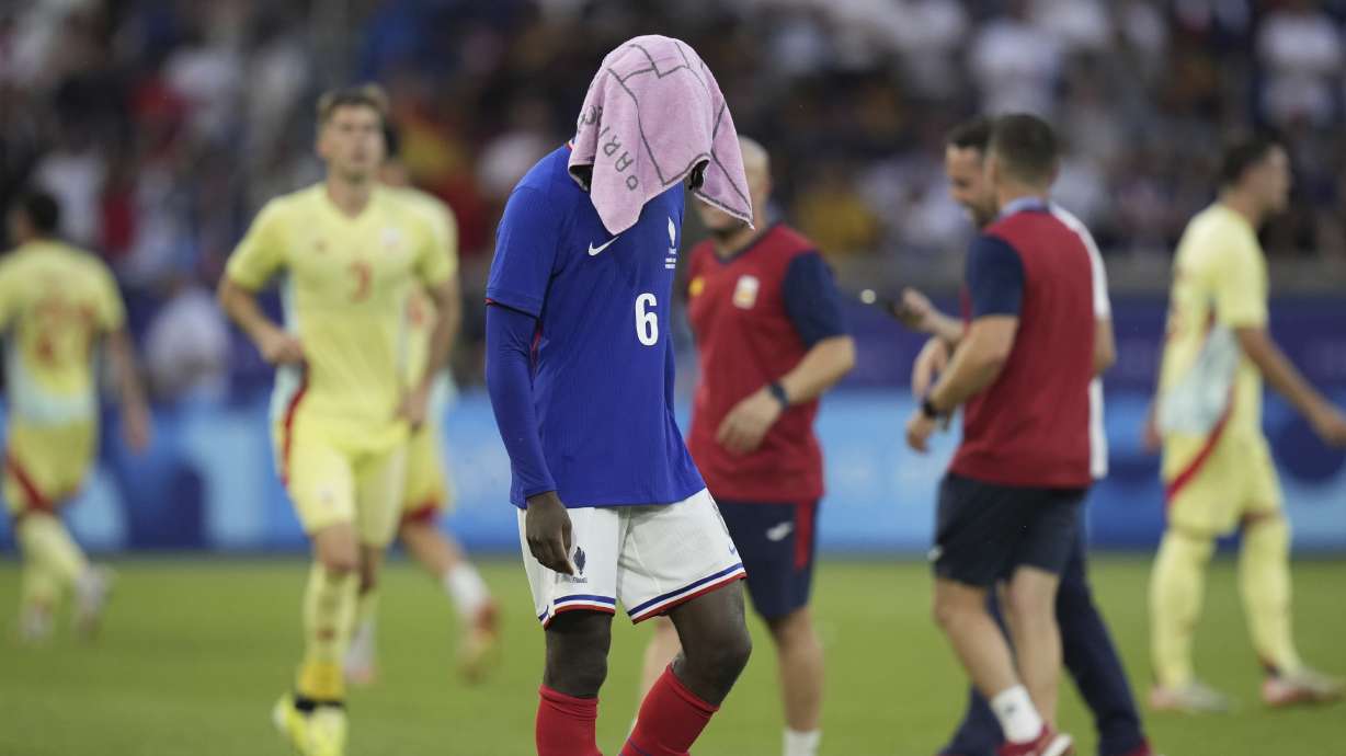 France's Manu Kone reacts after losing the men's soccer gold medal match against Spain at the Parc des Princes during the 2024 Summer Olympics, Friday, Aug. 9, 2024, in Paris, France.