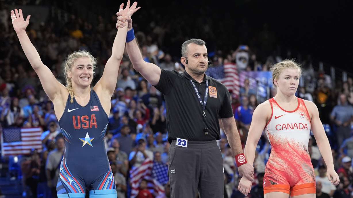 Helen Louise Maroulis, of the United State, celebrates after defeating Canada's Hannah Fay Taylor during their women's freestyle 57kg bronze medal wrestling match, at Champ-de-Mars Arena, during the 2024 Summer Olympics, Friday, Aug. 9, 2024, in Paris, France.