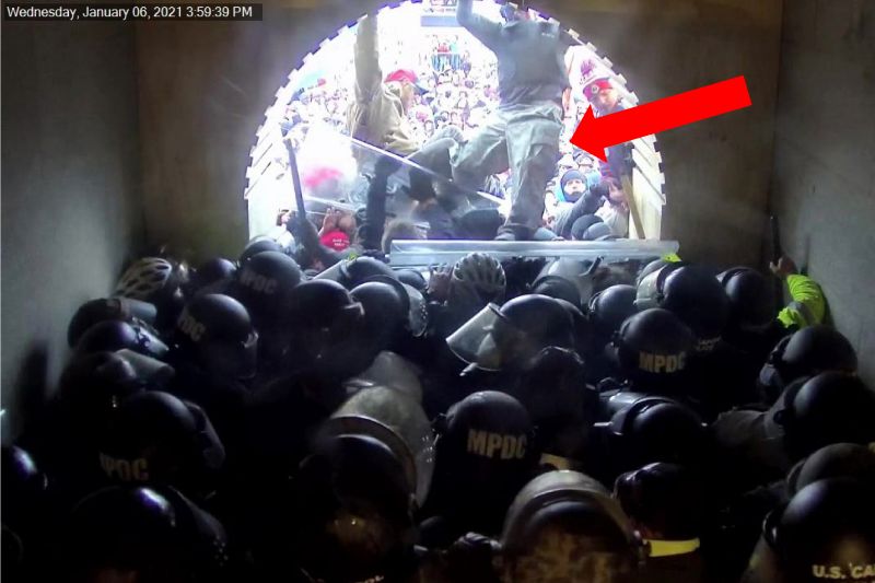 This image shows David Nicholas Dempsey stomping on police officers in the Lower West Terrace Tunnel at the U.S. Capitol on Jan. 6, 2021, in Washington.