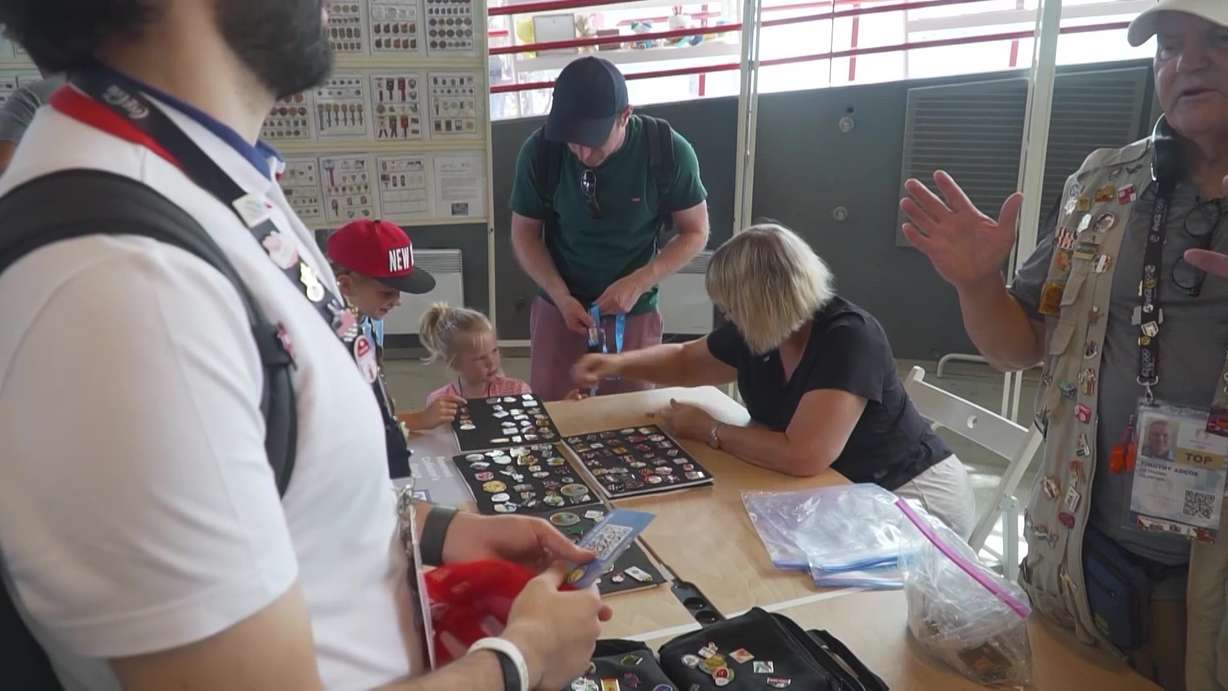 Pin collector Janet Grissom meets up with other pin collectors in Paris in this undated photo.