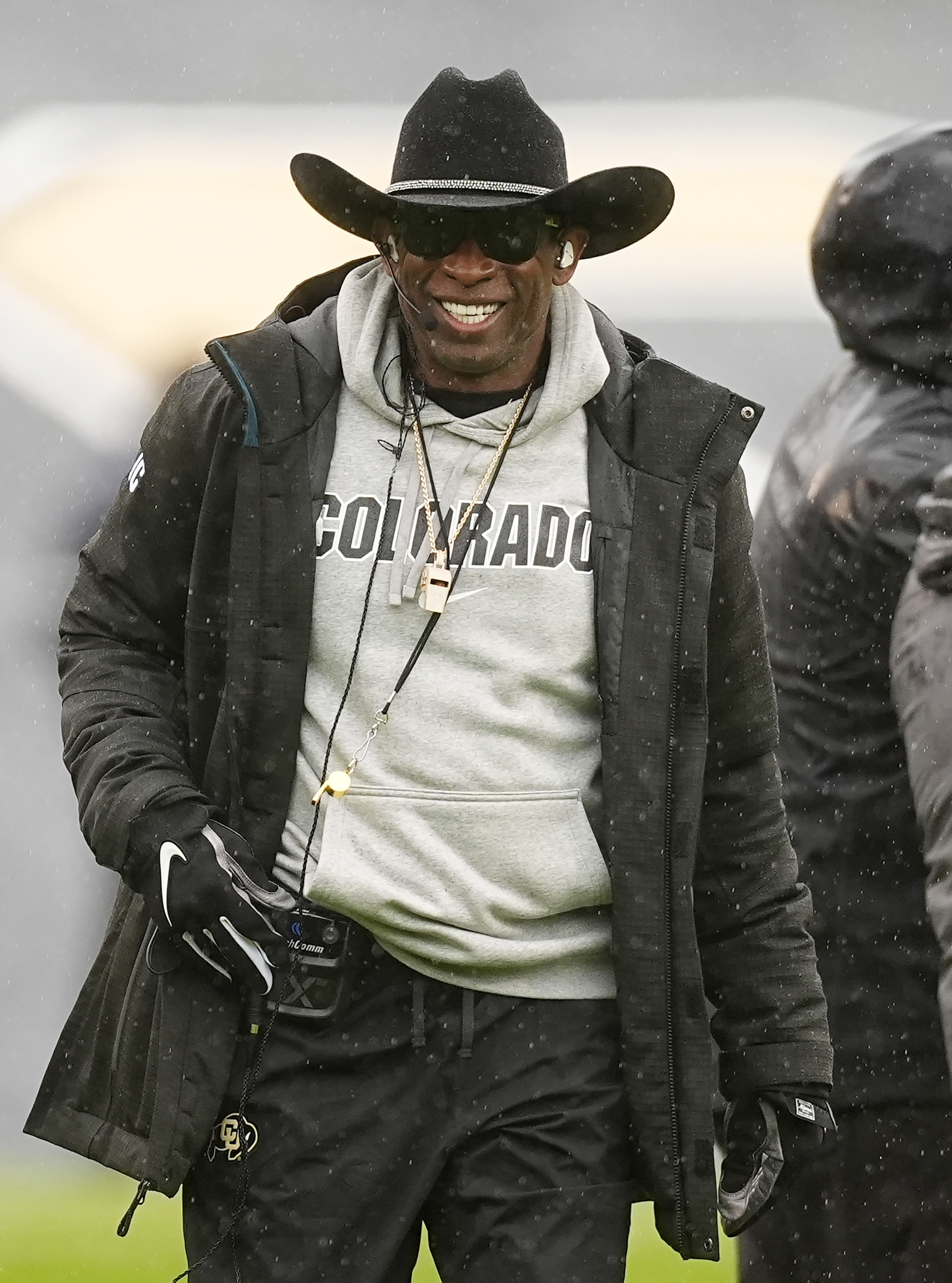 FILE - Colorado head coach Deion Sanders smiles during the first half of an NCAA spring college football game April 27, 2024, in Boulder, Colo. 