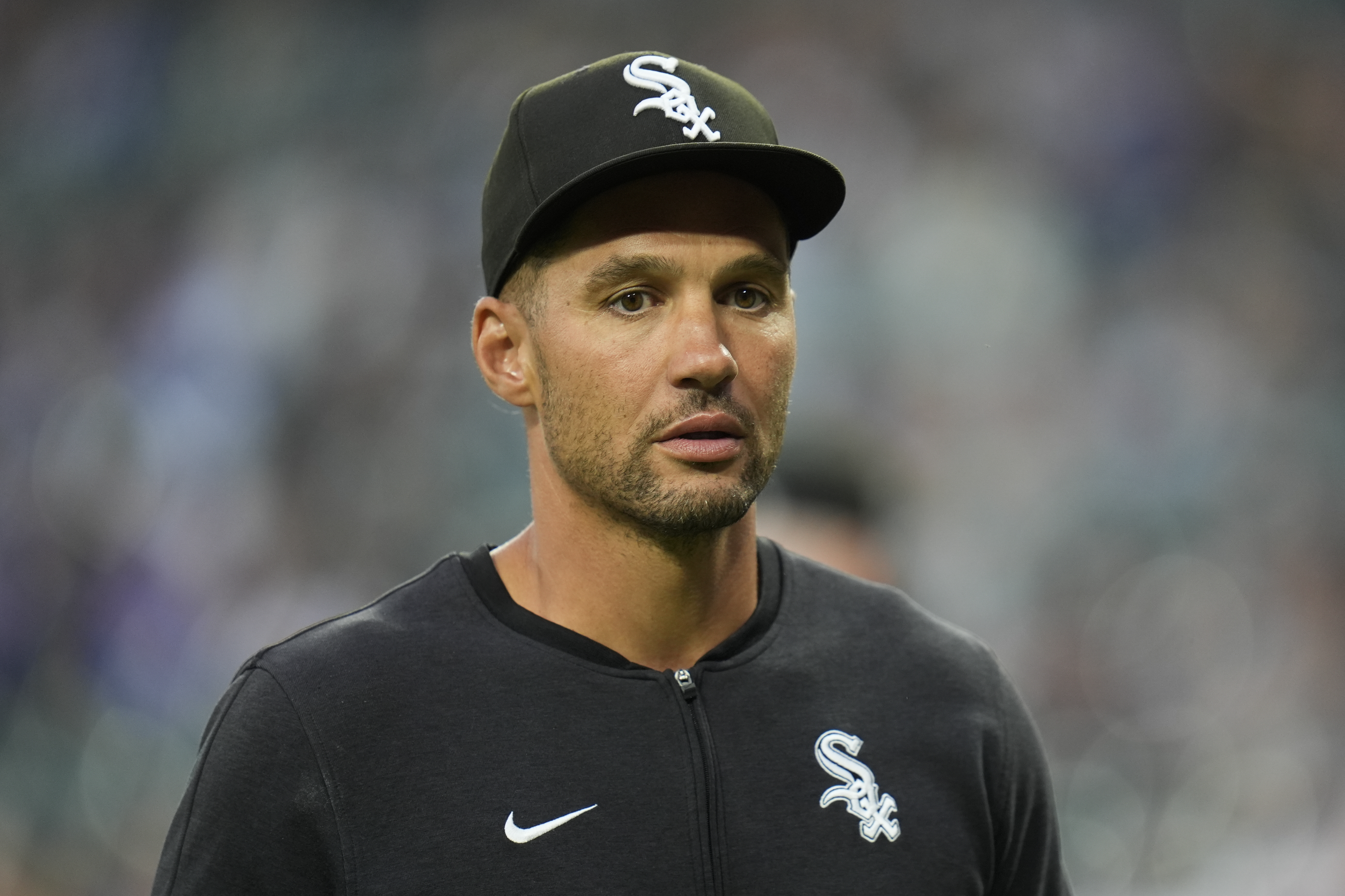 Chicago White Sox interim manager Grady Sizemore walks back to the dugout before a baseball game against the Chicago Cubs, Friday, Aug. 9, 2024, in Chicago. 