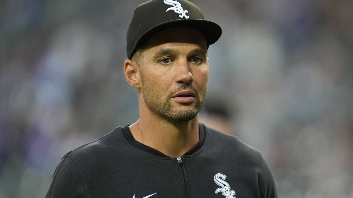 Chicago White Sox interim manager Grady Sizemore walks back to the dugout before a baseball game against the Chicago Cubs, Friday, Aug. 9, 2024, in Chicago.