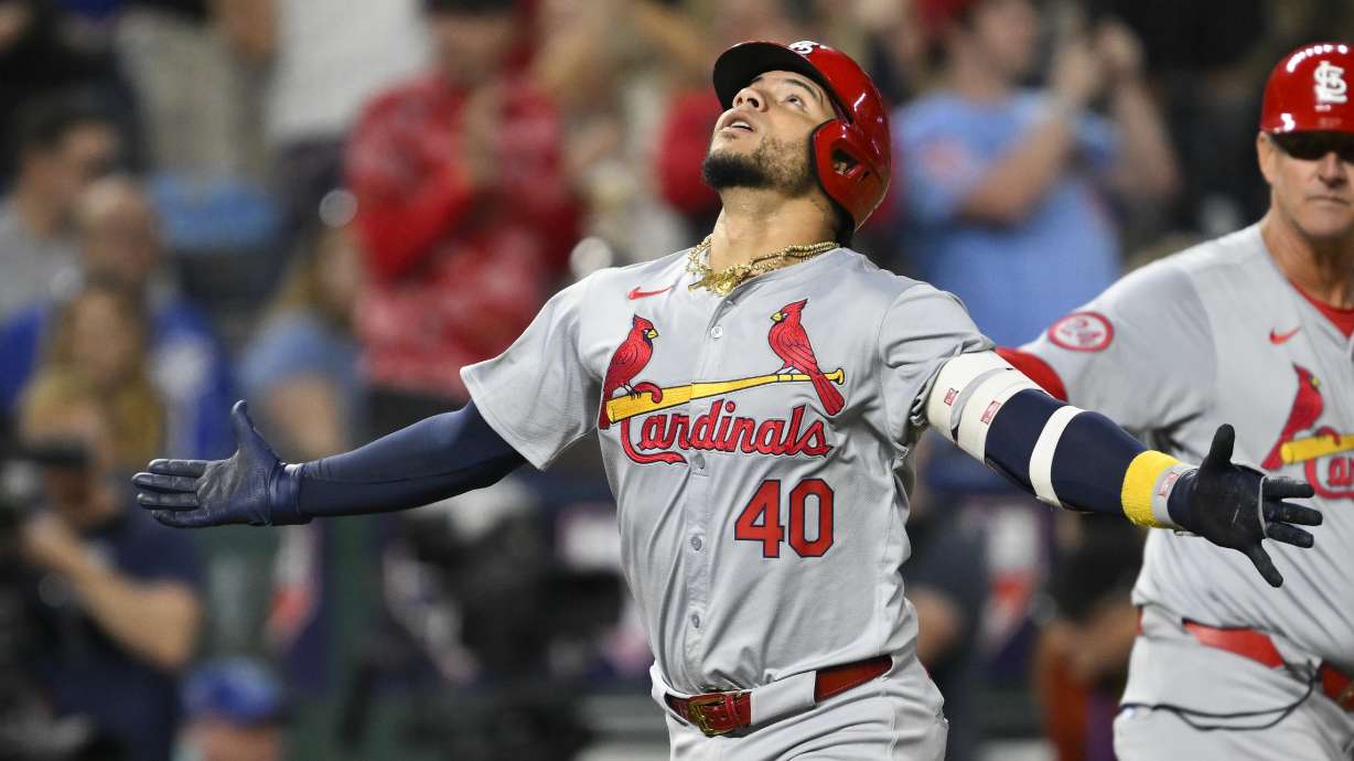 St. Louis Cardinals' Willson Contreras celebrates a two-run home run during the ninth inning of a baseball game against the Kansas City Royals, Friday, Aug. 9, 2024, in Kansas City, Mo.