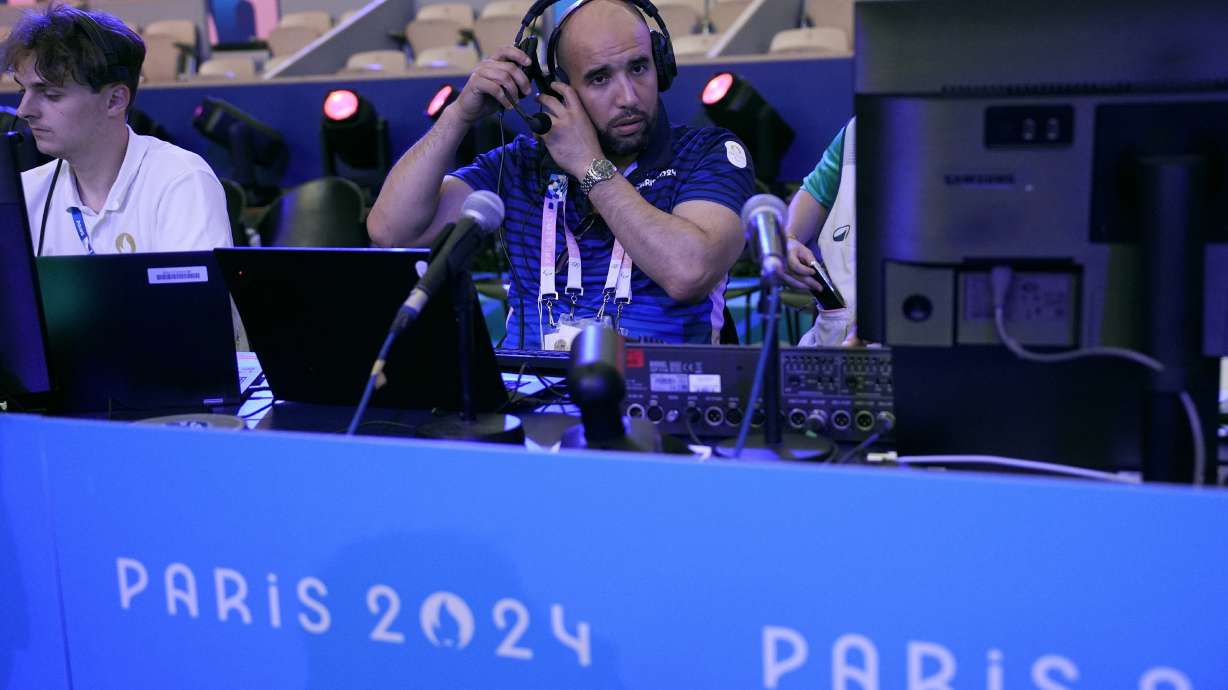 Nacer Eddine Zorgani prepares for the night's boxing matches at the 2024 Summer Olympics, Thursday, Aug. 8, 2024, in Paris, France.