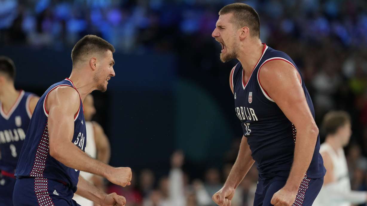 Nikola Jokic (15), of Serbia celebrates a basket against Germany during a men's bronze medal basketball game at Bercy Arena at the 2024 Summer Olympics, Saturday, Aug. 10, 2024, in Paris, France.