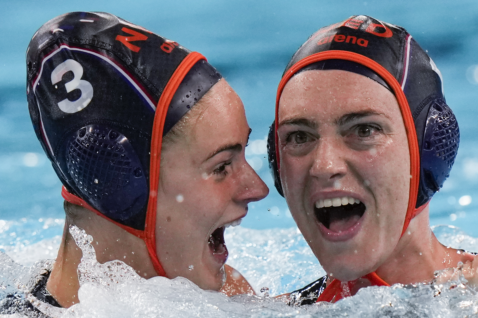 Netherland's Sabrina Van Der Sloot, right, celebrates with teammate Brigitte Sleeking after scoring against United States during the women's bronze medal water polo match at the 2024 Summer Olympics, Saturday, Aug. 10, 2024, in Paris, France. 