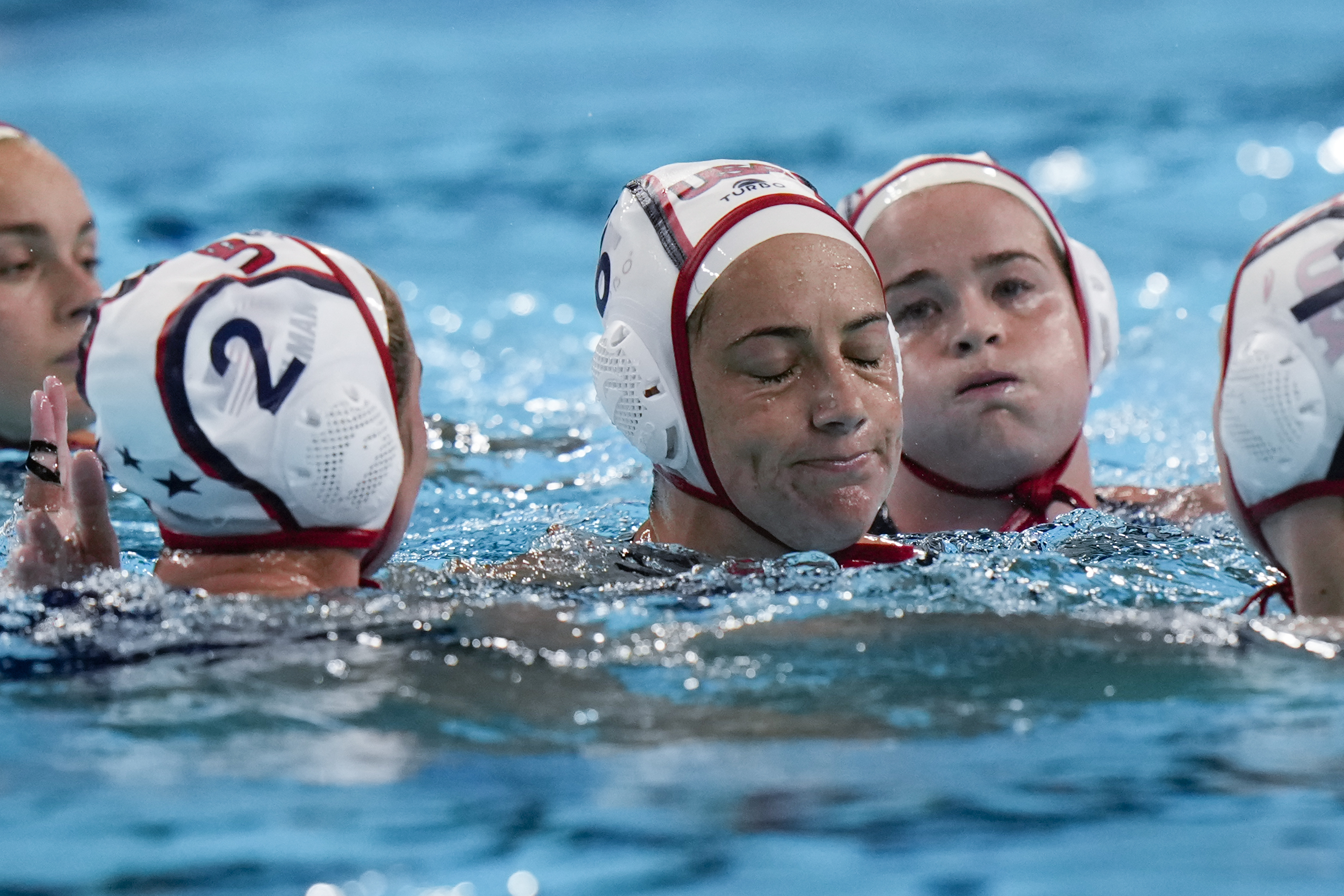 United States' players react after loosing the women's bronze medal water polo match against Netherlands at the 2024 Summer Olympics, Saturday, Aug. 10, 2024, in Paris, France. 