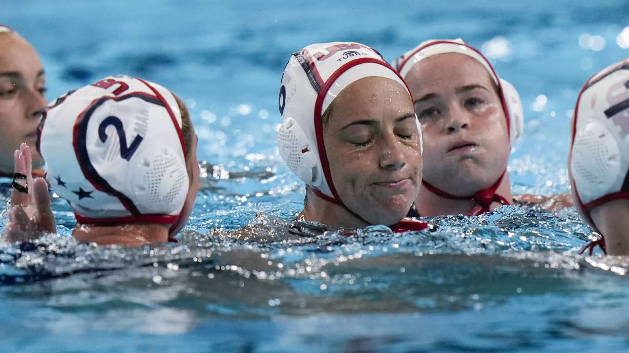 United States' players react after loosing the women's bronze medal water polo match against Netherlands at the 2024 Summer Olympics, Saturday, Aug. 10, 2024, in Paris, France.