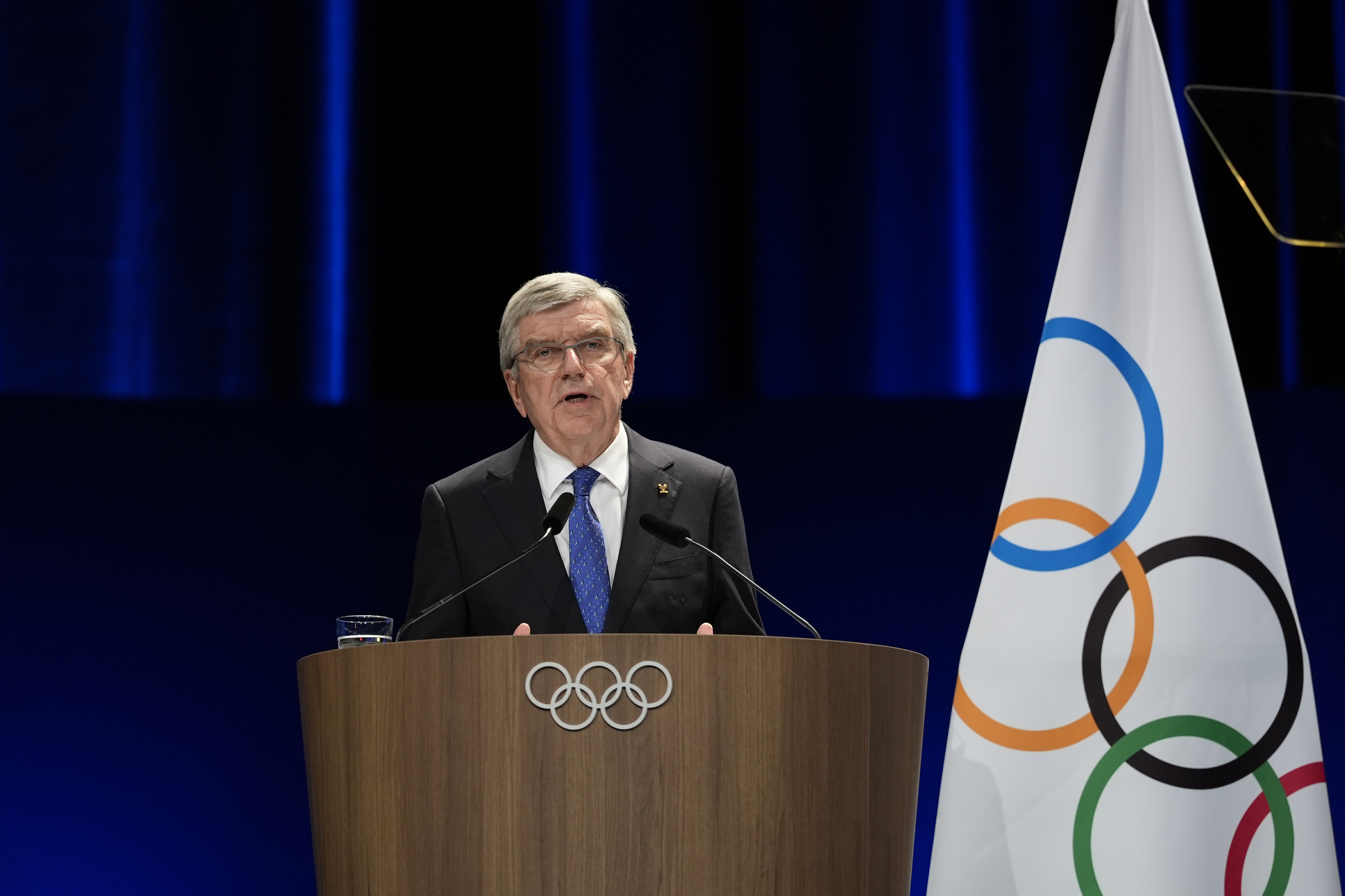 IOC president Thomas Bach addresses the audience during the 142nd IOC session at the 2024 Summer Olympics, Saturday, Aug. 10, 2024, in Paris, France. 