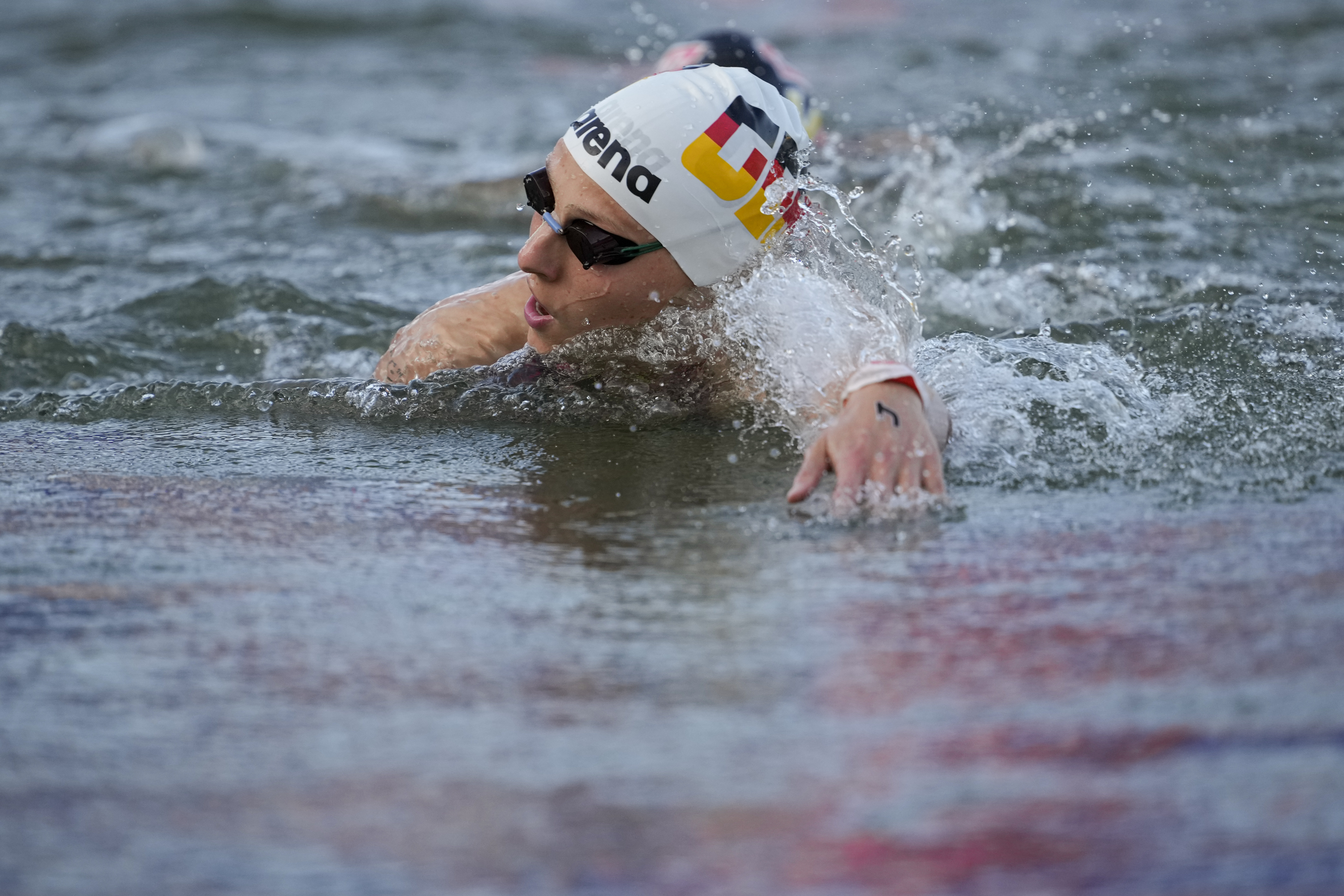 Germany's Leonie Beck competes during the marathon swimming women's 10km competition at the 2024 Summer Olympics, Thursday, Aug. 8, 2024, in Paris, France.