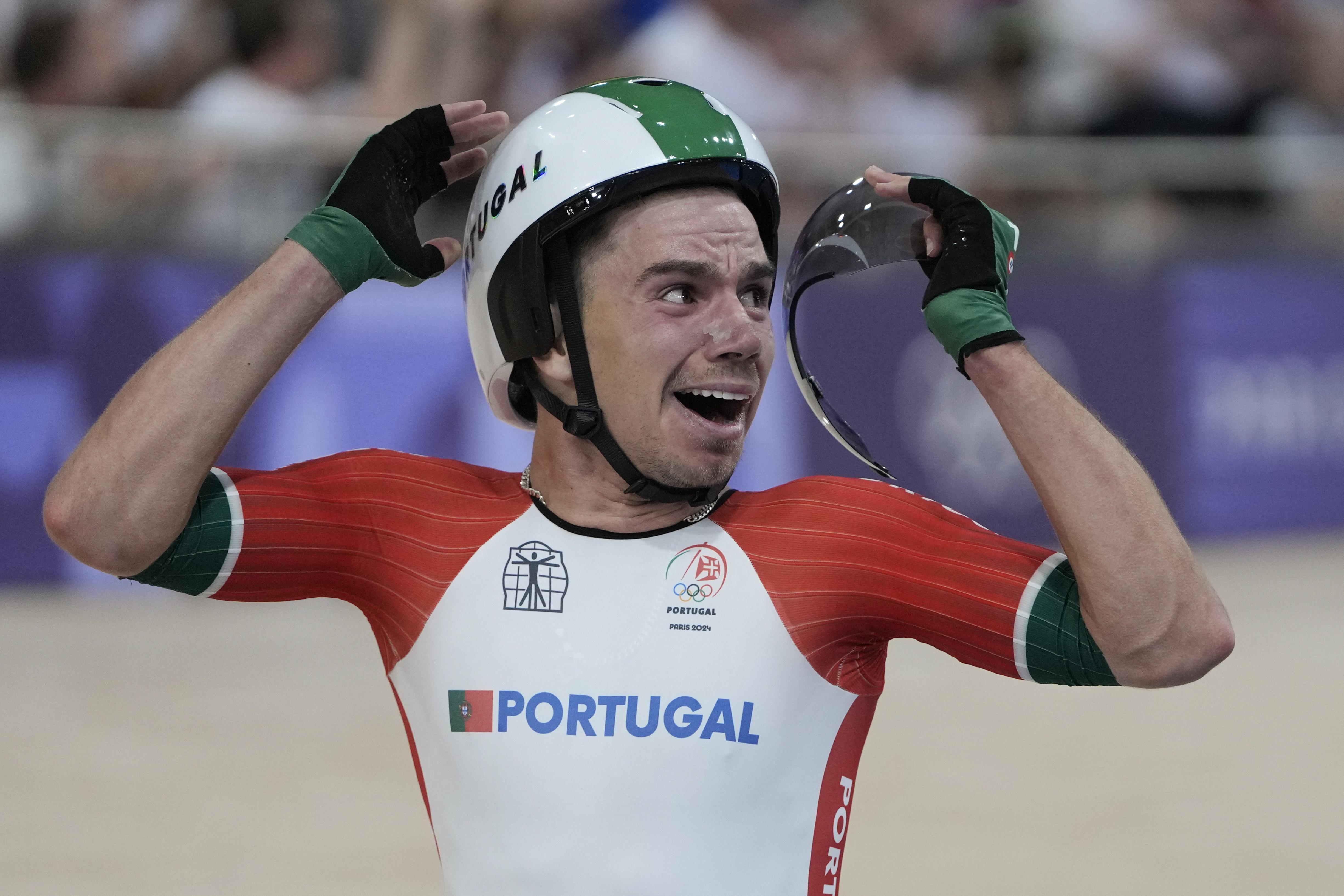 Portugal's Rui Oliveira celebrates winning the gold medal of the men's madison event, at the Summer Olympics, Saturday, Aug. 10, 2024, in Paris, France. 