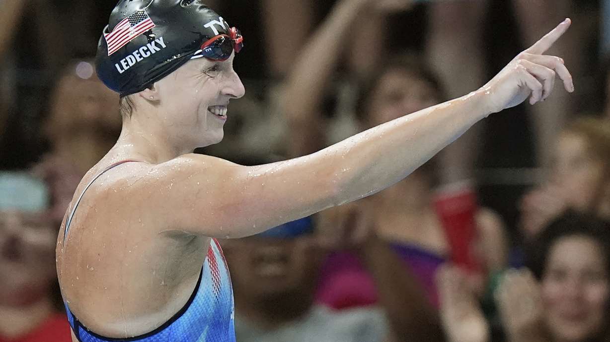 United States' Katie Ledecky celebrates winning the gold medal in the women's 800-meter freestyle final at the Summer Olympics in Nanterre, France, Saturday, Aug. 3, 2024.