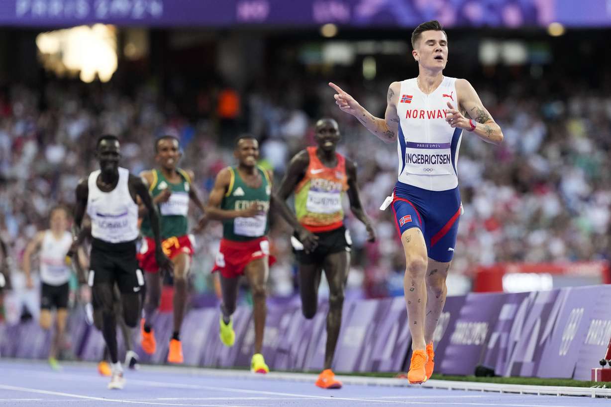 Jakob Ingebrigtsen, of Norway, celebrates after winning the men's 5000-meter final at the 2024 Summer Olympics, Saturday, Aug. 10, 2024, in Saint-Denis, France.