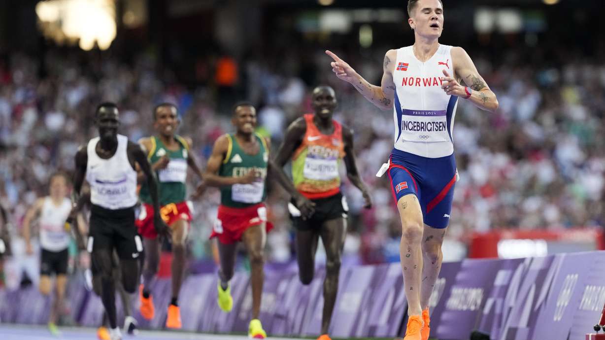 Jakob Ingebrigtsen, of Norway, celebrates after winning the men's 5000-meter final at the 2024 Summer Olympics, Saturday, Aug. 10, 2024, in Saint-Denis, France.