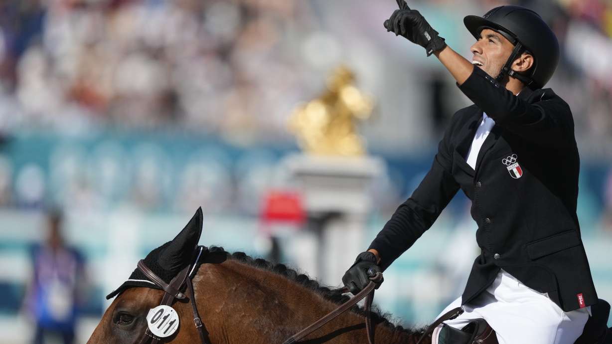 Egypt's Ahmed Elgendy competes in the men's individual Riding Show Jumping portion of Modern Pentathlon at the 2024 Summer Olympics, Saturday, Aug. 10, 2024, in Versailles, France.