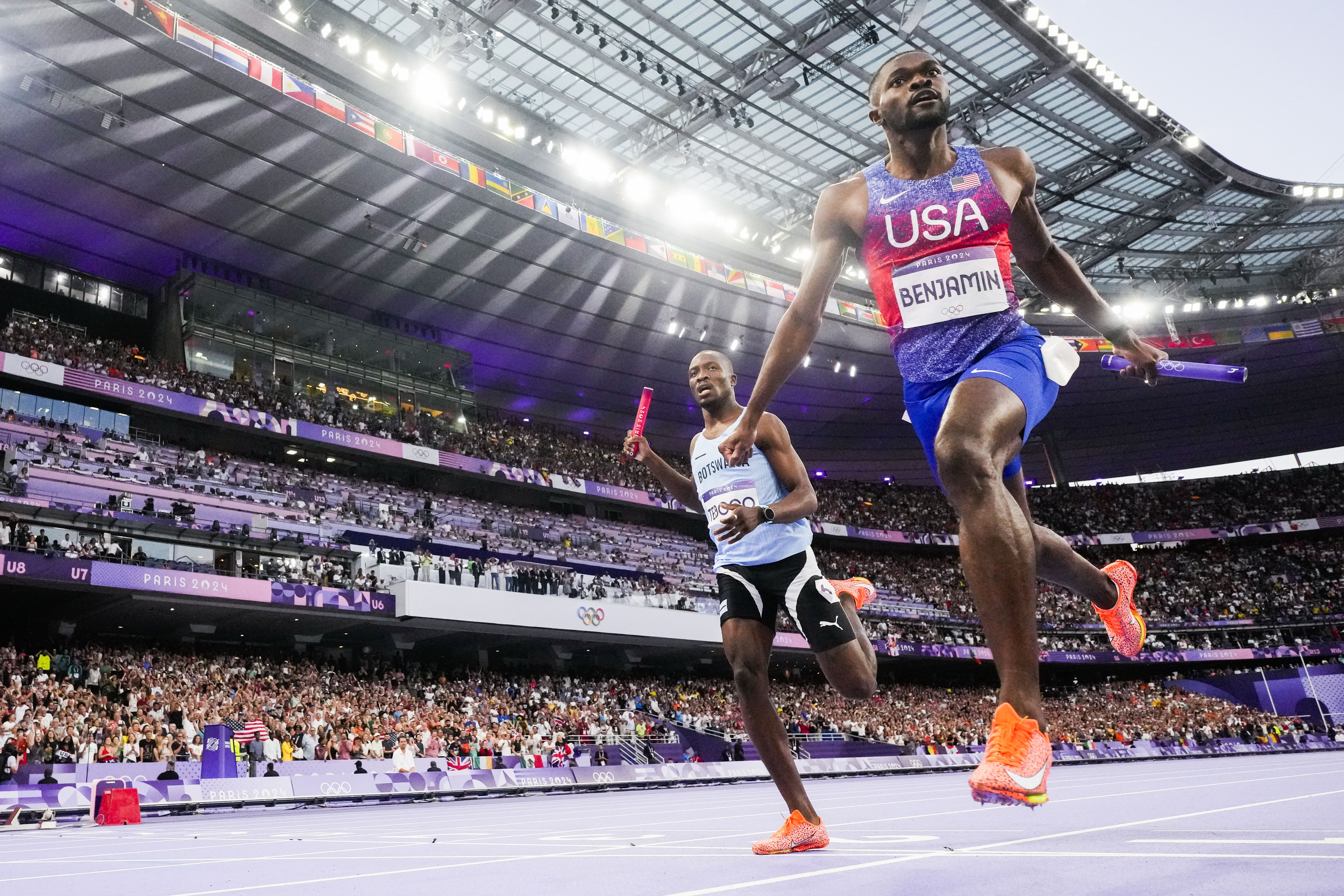 Rai Benjamin, of the United States, celebrates after winning the men's 4 x 400-meter relay final at the 2024 Summer Olympics, Saturday, Aug. 10, 2024, in Saint-Denis, France. 