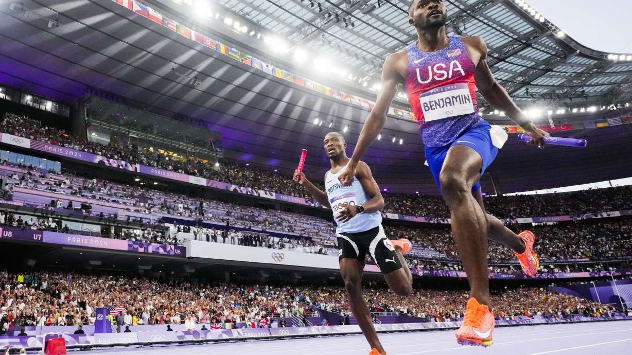Rai Benjamin, of the United States, celebrates after winning the men's 4 x 400-meter relay final at the 2024 Summer Olympics, Saturday, Aug. 10, 2024, in Saint-Denis, France.