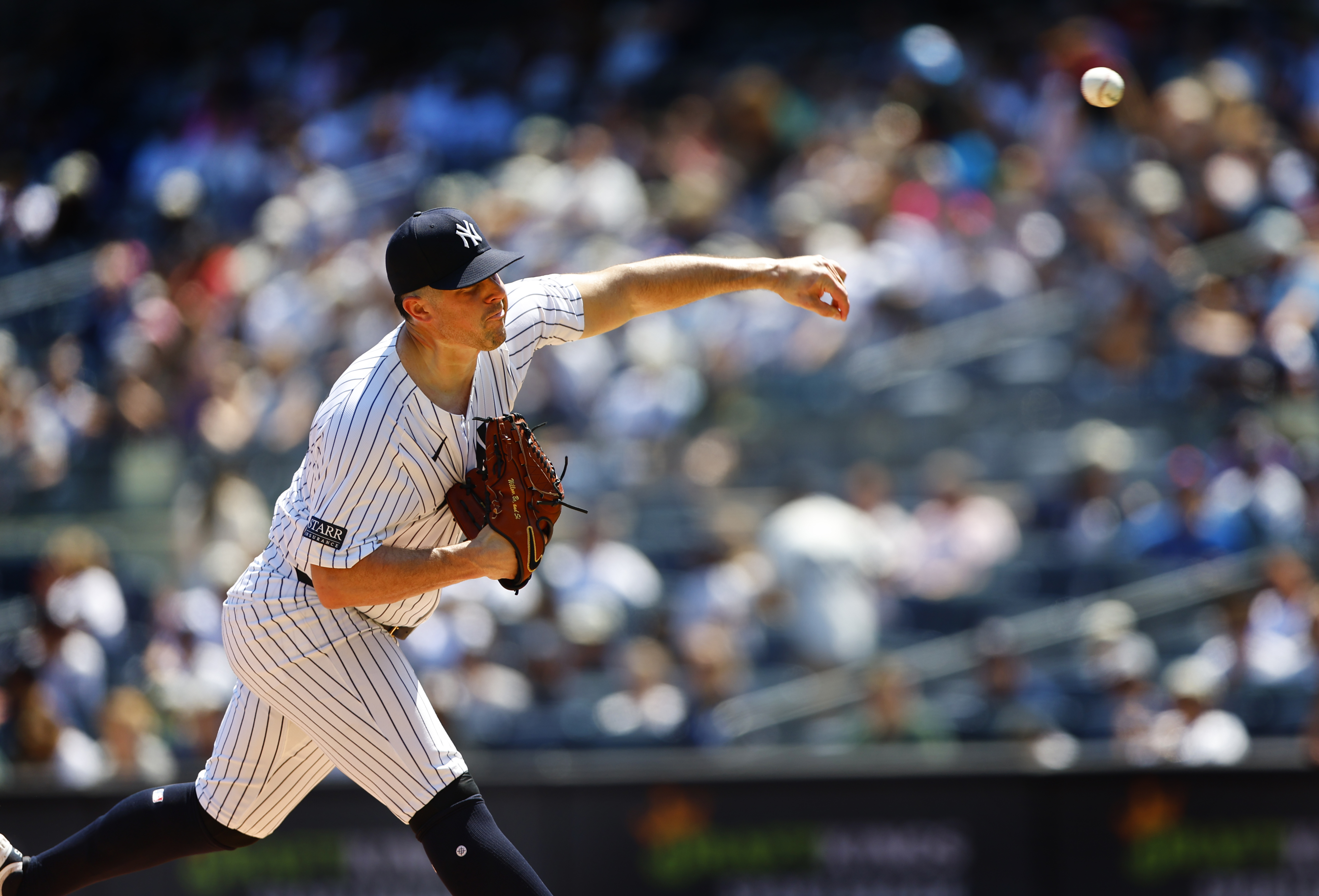 New York Yankees' Carlos Rodón pitches against the Texas Rangers during the first inning of the first game of a baseball double header, Saturday, Aug. 10, 2024, in New York. 