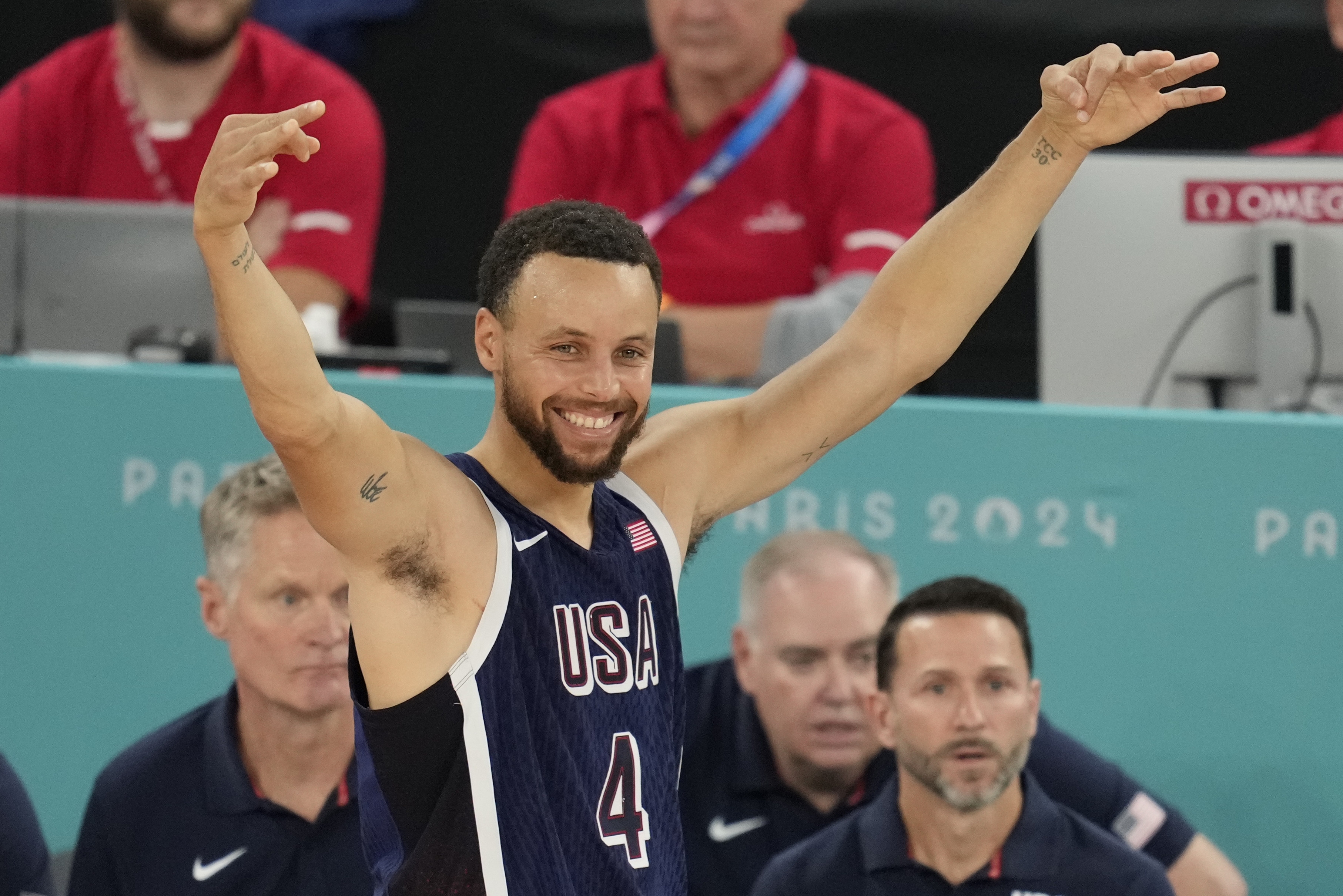 United States' Stephen Curry (4) reacts during a men's gold medal basketball game at Bercy Arena at the 2024 Summer Olympics, Saturday, Aug. 10, 2024, in Paris, France.