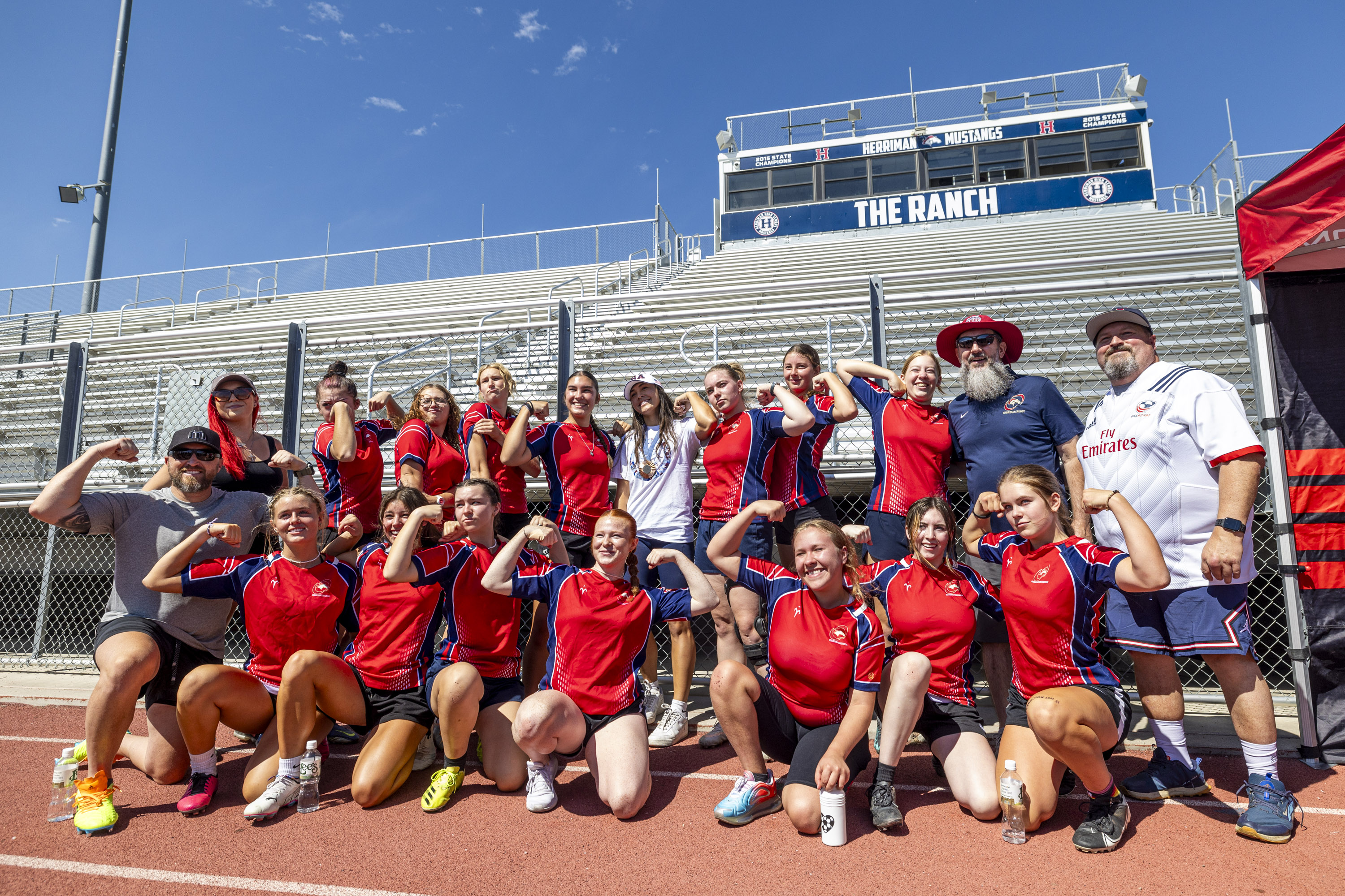 Alex "Spiff" Sedrick poses for a photo with the Herriman High School club rugby team during a rugby fundraising event held by the Spiff Fund at Herriman High School in Herriman on Saturday, Aug. 10, 2024.