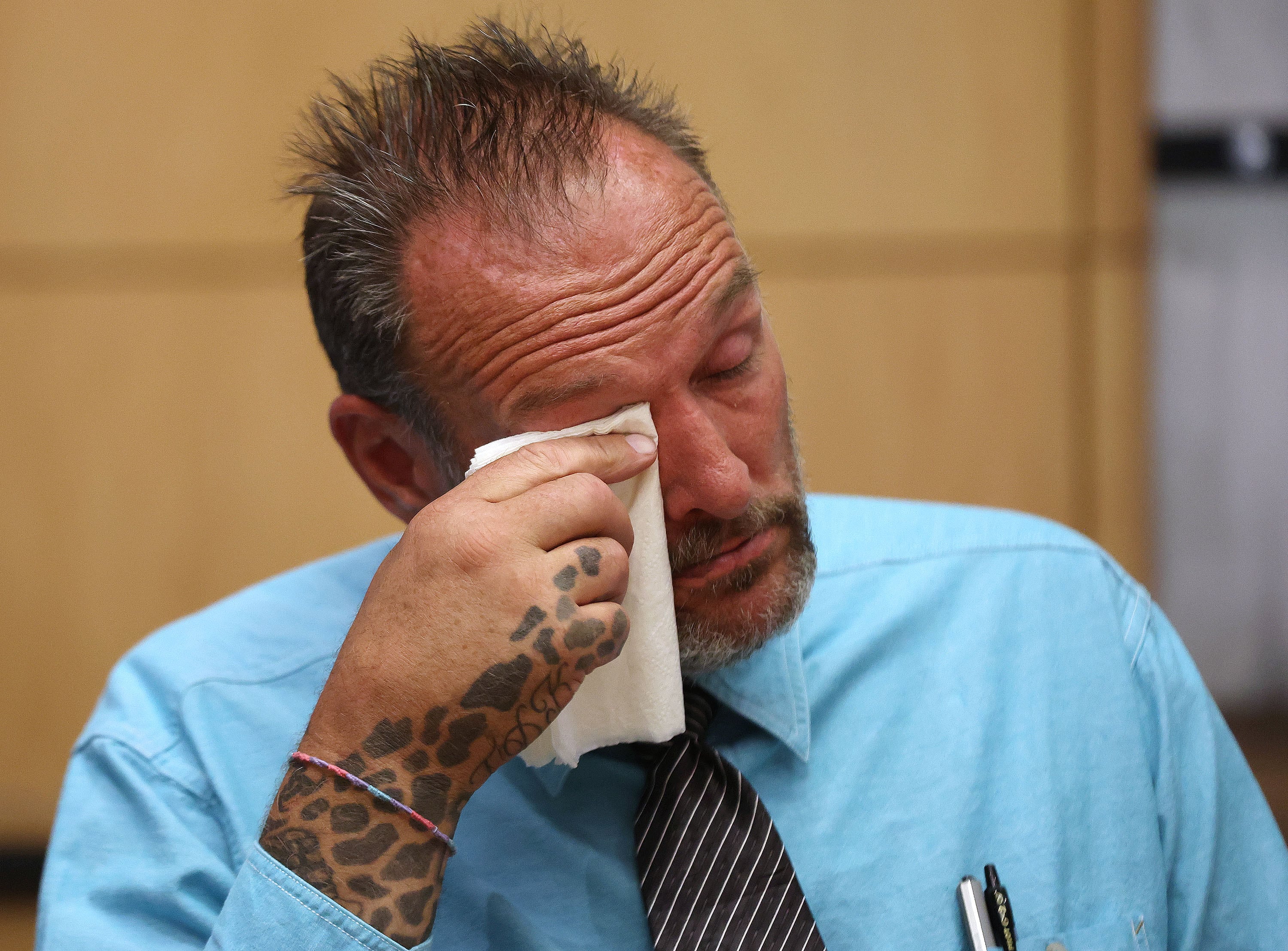 Odyssey House client Steven Glenn gets emotional as he talks about his recovery process from fentanyl addiction in Salt Lake City on June 20.