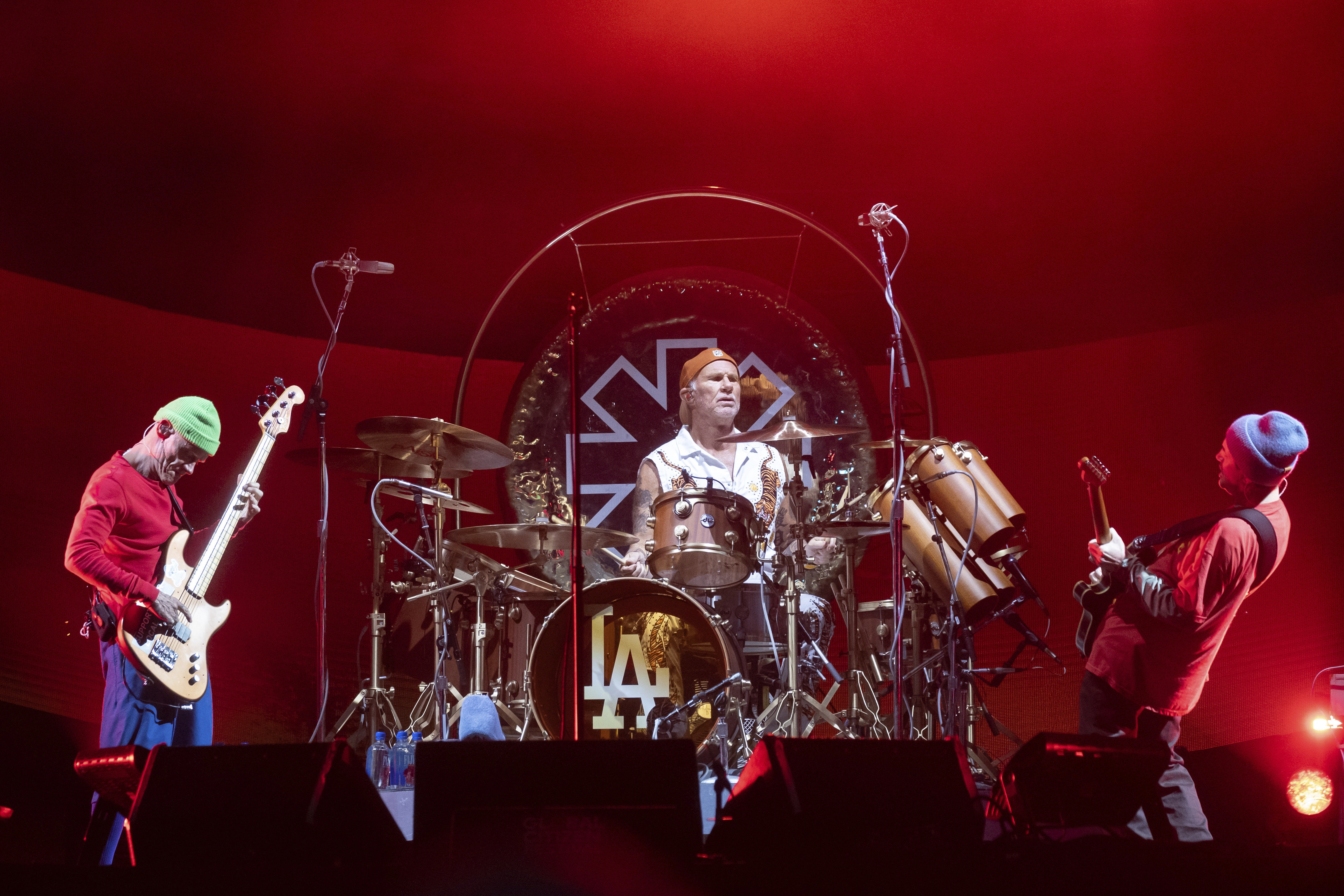 FILE - Members of the Red Hot Chili Peppers from left to right, Flea, Chad Smith, and John Frusciante perform during the Global Citizen Festival on Sept. 23, 2023, at Central Park in New York. 