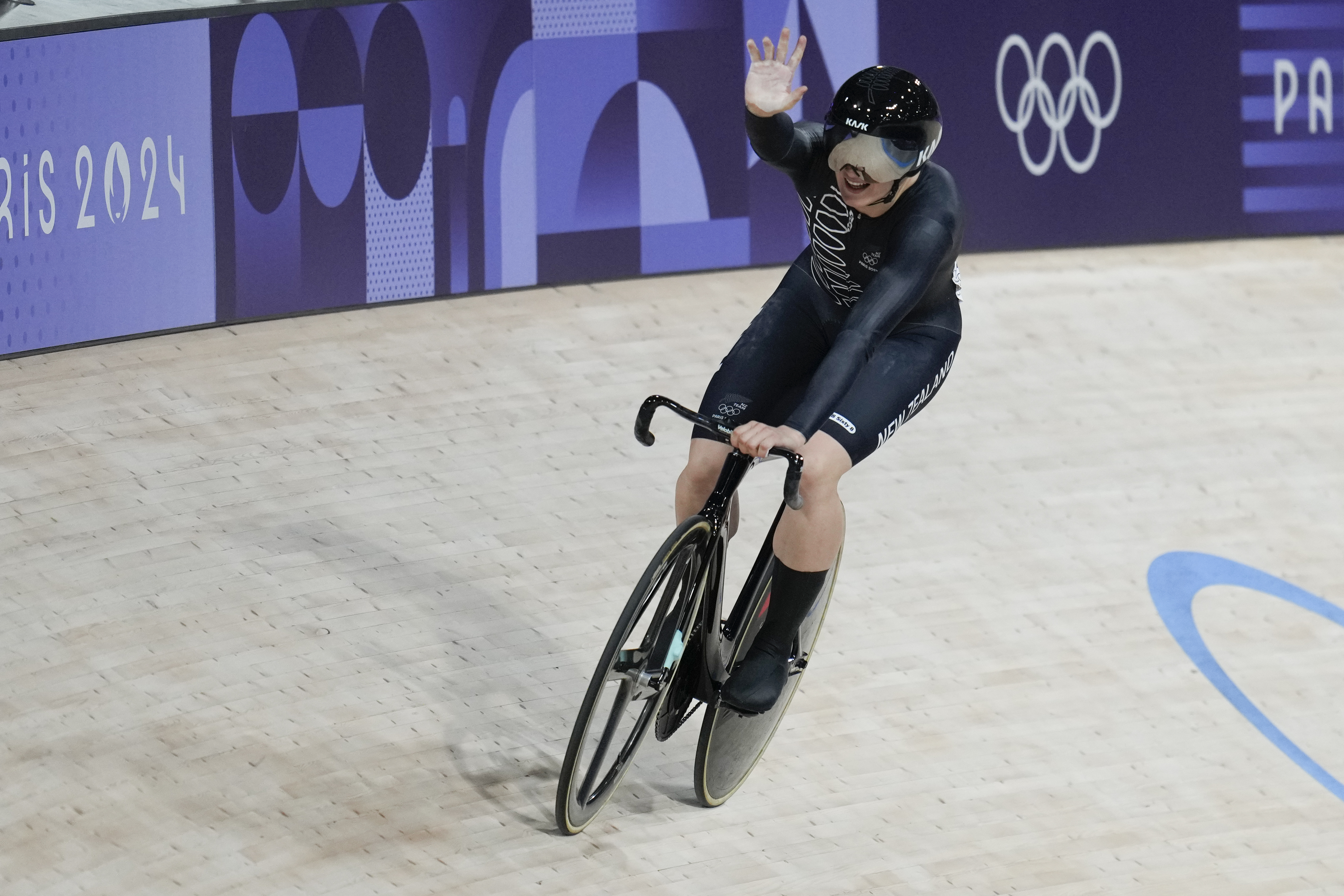 Ellesse Andrews of New Zealand celebrates winning a semifinal of the women's sprint event, at the Summer Olympics, Sunday, Aug. 11, 2024, in Paris, France. 