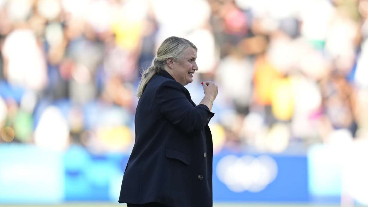 head coach Emma Hayes of the United States celebrates after defeating Brazil during the women's soccer gold medal match between Brazil and the United States at the Parc des Princes during the 2024 Summer Olympics, Saturday, Aug. 10, 2024, in Paris, France.