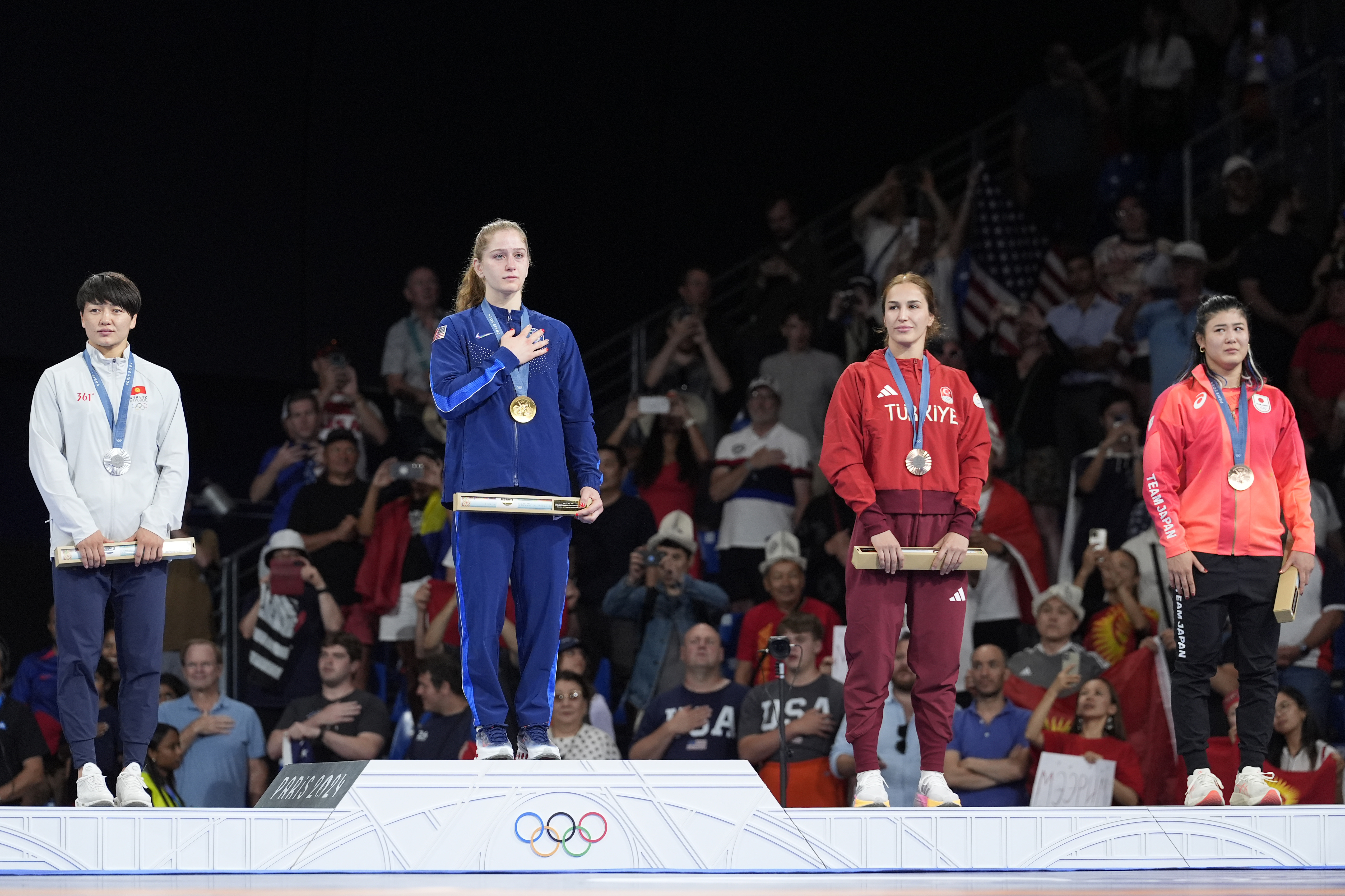 Medalists, from left, Kyrgyzstan's Meerim Zhumanazarova, silver, United State's Amit Elor, gold, Turkey's Buse Tosun Cavusoglu, Japan's Nonoka Ozaki, bronze, pose during the medal ceremony for women's freestyle 68kg wrestling, at Champ-de-Mars Arena, during the 2024 Summer Olympics, Tuesday, Aug. 6, 2024, in Paris, France. 