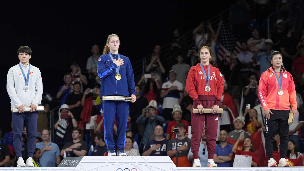 Medalists, from left, Kyrgyzstan's Meerim Zhumanazarova, silver, United State's Amit Elor, gold, Turkey's Buse Tosun Cavusoglu, Japan's Nonoka Ozaki, bronze, pose during the medal ceremony for women's freestyle 68kg wrestling, at Champ-de-Mars Arena, during the 2024 Summer Olympics, Tuesday, Aug. 6, 2024, in Paris, France.