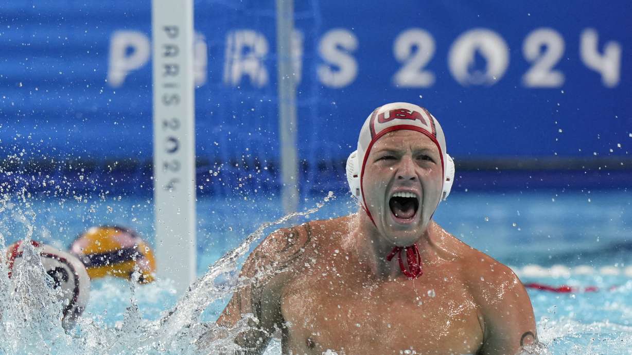 United States' Hannes Daube celebrates after scoring against Hungary during the men's water polo bronze medal match at the 2024 Summer Olympics, Sunday, Aug. 11, 2024, in Paris, France.