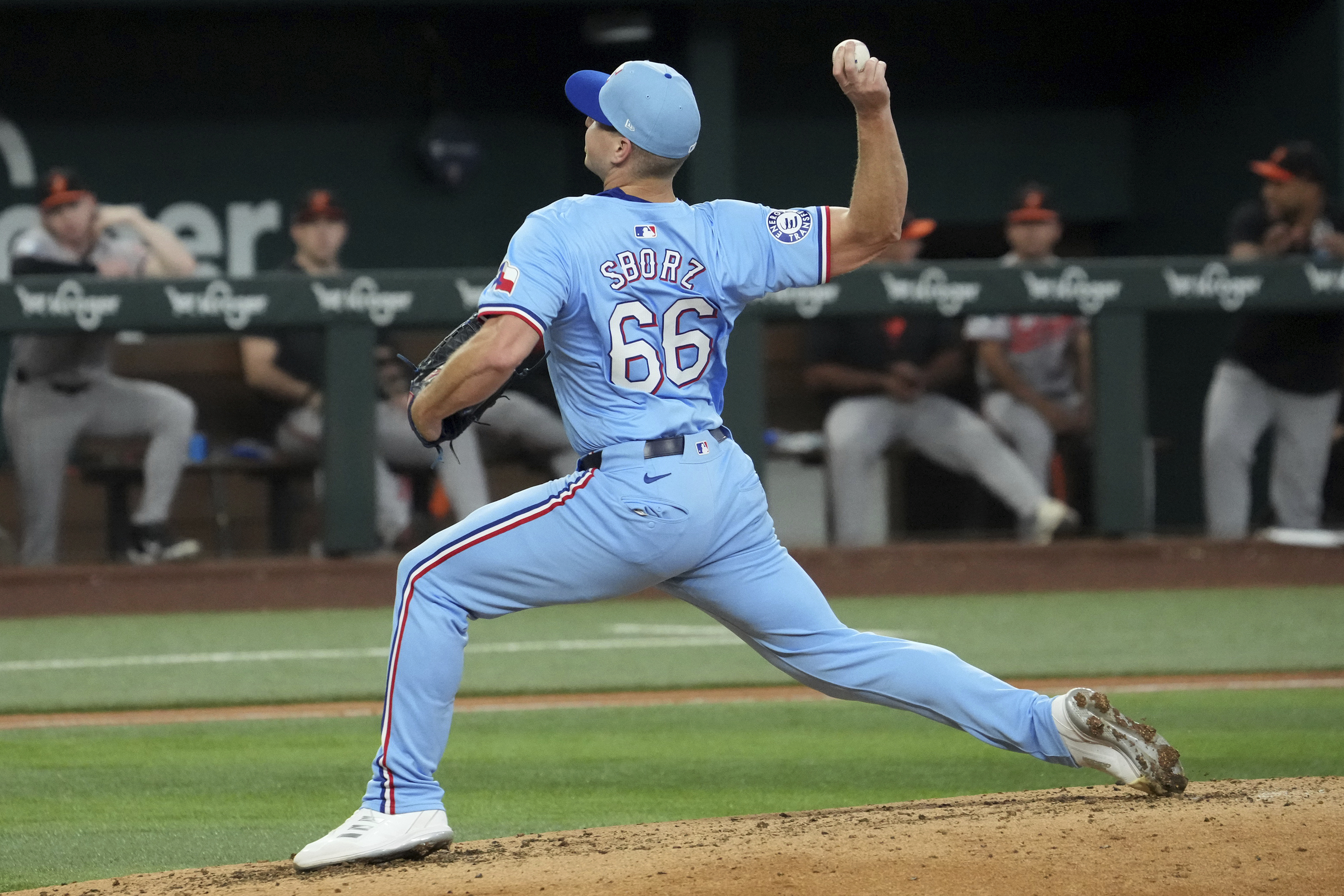 Texas Rangers relief pitcher Josh Sborz throws against the Baltimore Orioles during the sixth inning of a baseball game Sunday, July 21, 2024, in Arlington, Texas. 