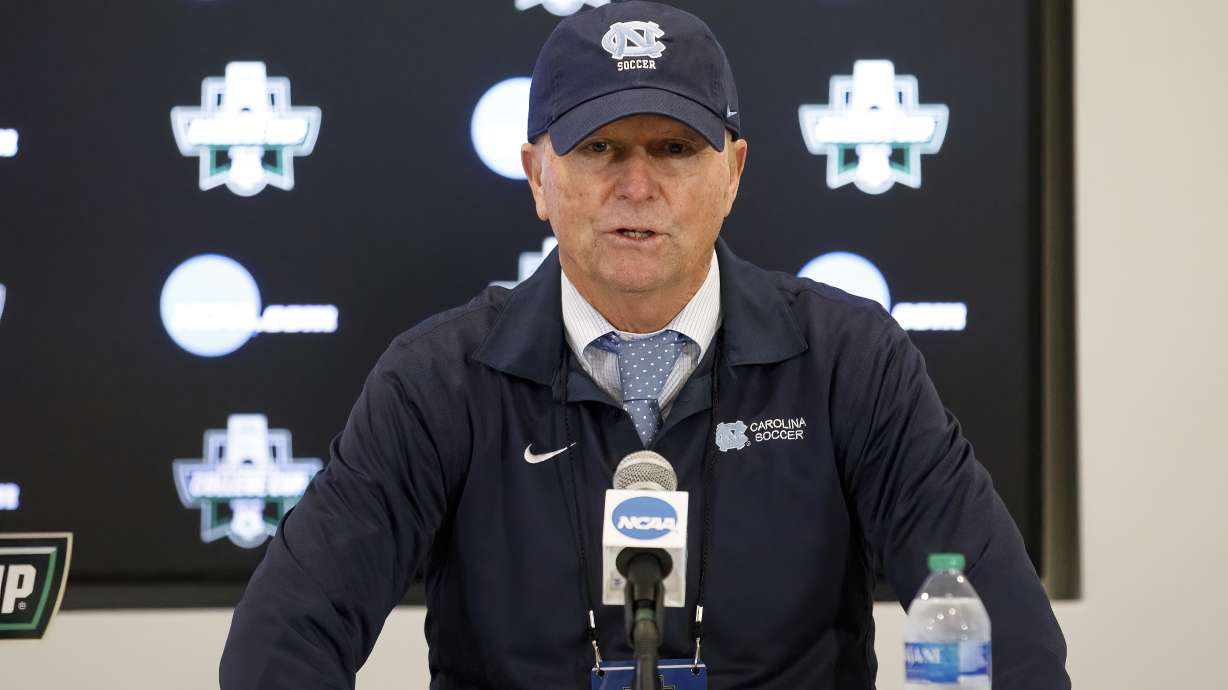 FILE - North Carolina coach Anson Dorrance speaks to the media following the team's win over Florida State in an NCAA women's soccer tournament semifinal in Cary, N.C., Dec. 2, 2022.