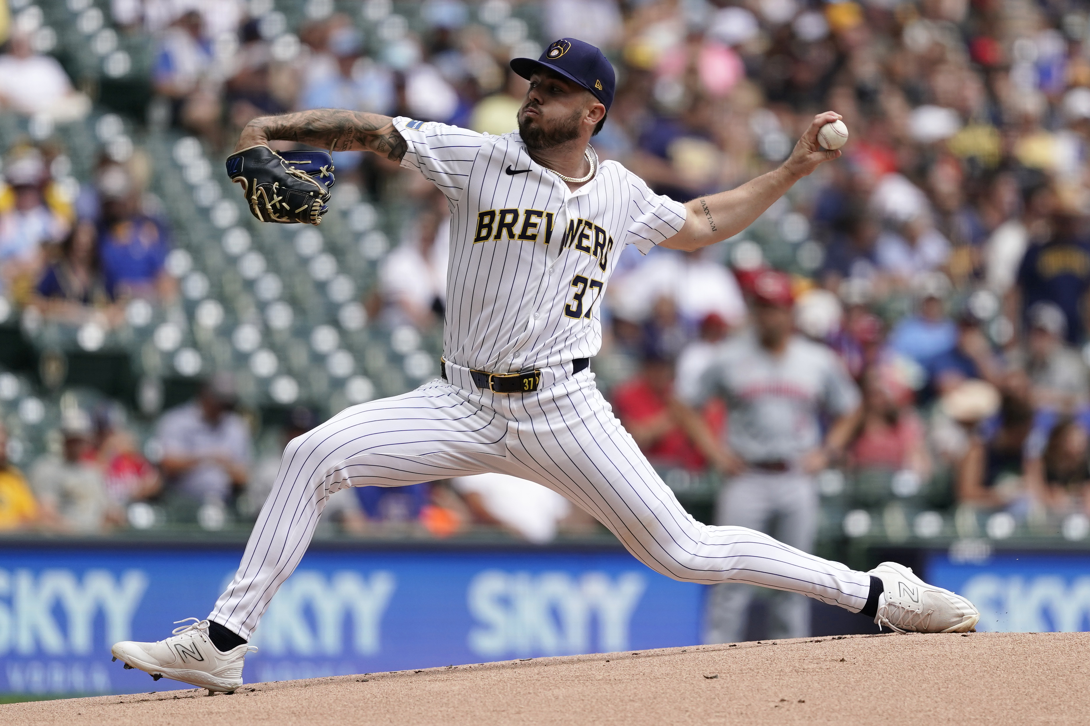 Milwaukee Brewers' DL Hall pitches during the first inning of a baseball game against the Cincinnati Reds, Sunday, Aug. 11, 2024, in Milwaukee.