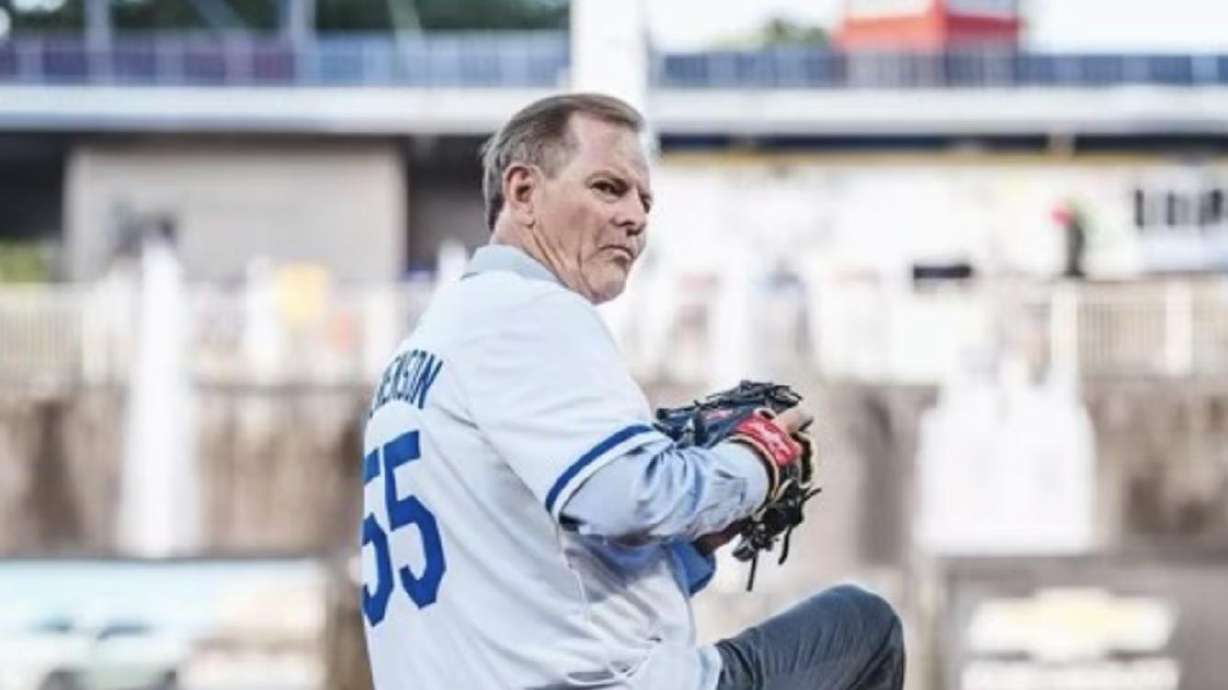 Elder Gary E. Stevenson of the Quorum of the Twelve Apostles of The Church of Jesus Christ of Latter-day Saints throws the ceremonial first pitch at the Kansas City Royals baseball game in Kansas City, Missouri, on Tuesday.